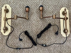 Pair Brass and Bakelite Swing-Arm Sconces