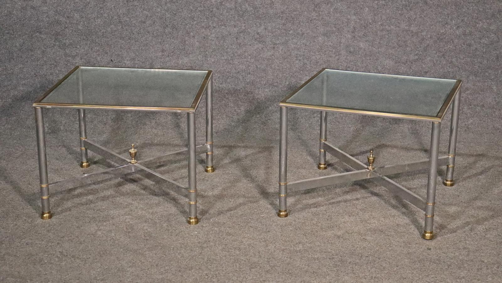 This is a chic pair of Maison Jansen style steel and brass and they each measure 15 5/8