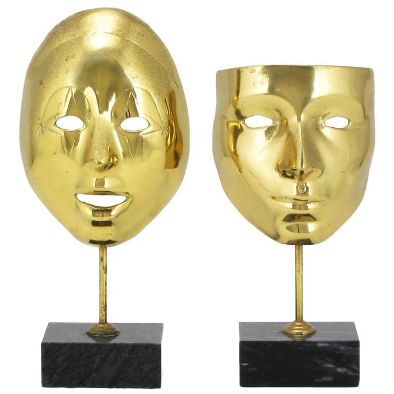 Pair Brass Carnivale Masks Mounted On Black Marble For Sale