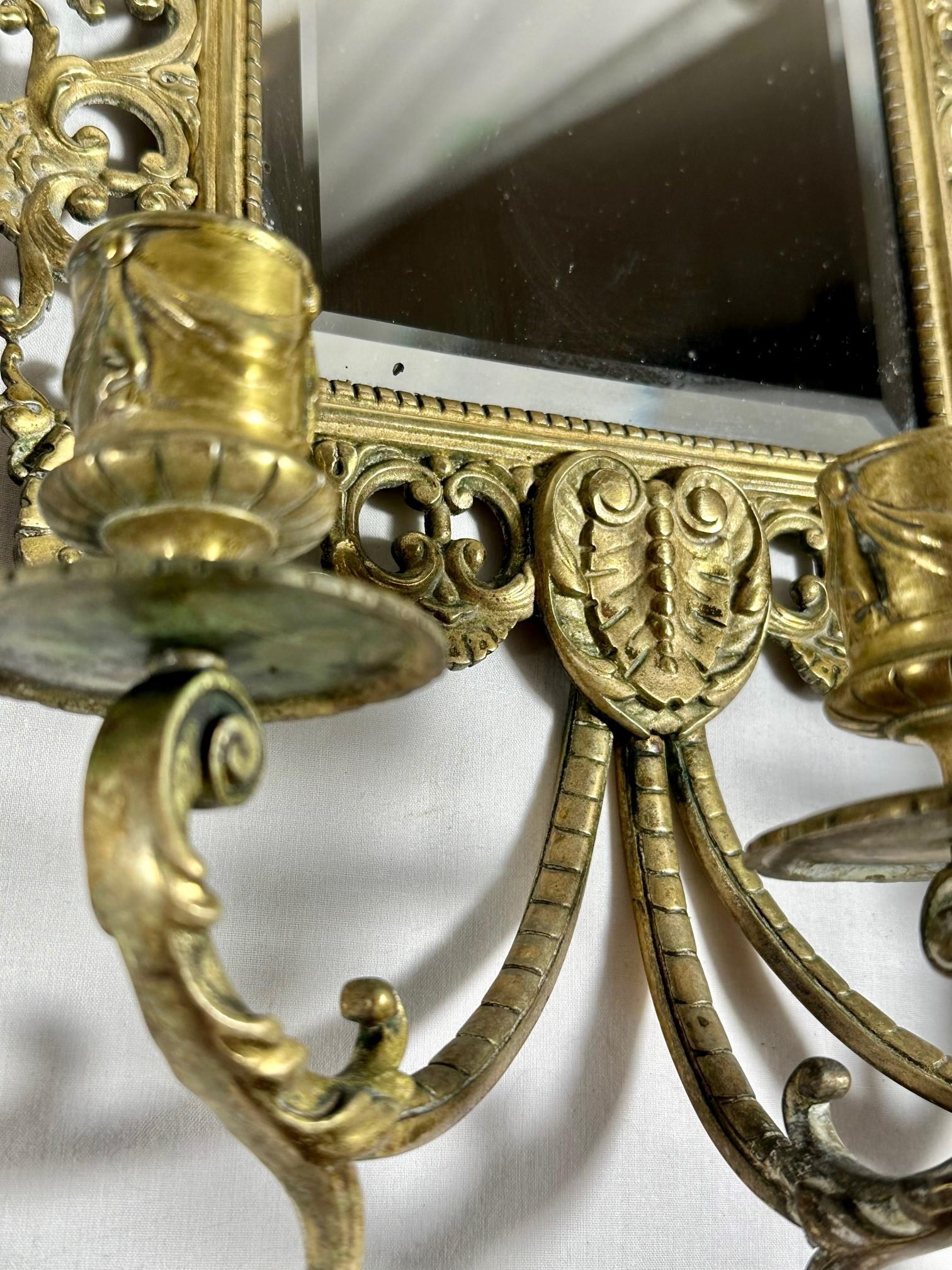 English Pair Brass Mirrored Three Arm Candle Victorian Wall Sconces.