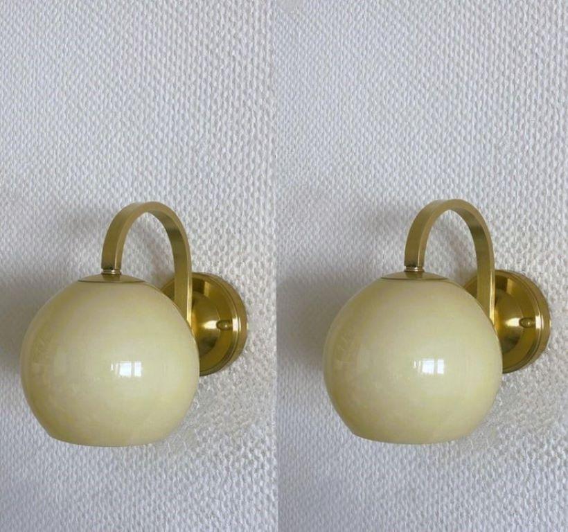 Scandinavian Modern Pair Brass Opaline Glass Wall Sconces Atributed to Paavo Tynell, Finland, 1950s For Sale