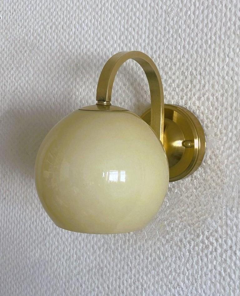 Finnish Pair Brass Opaline Glass Wall Sconces Atributed to Paavo Tynell, Finland, 1950s For Sale