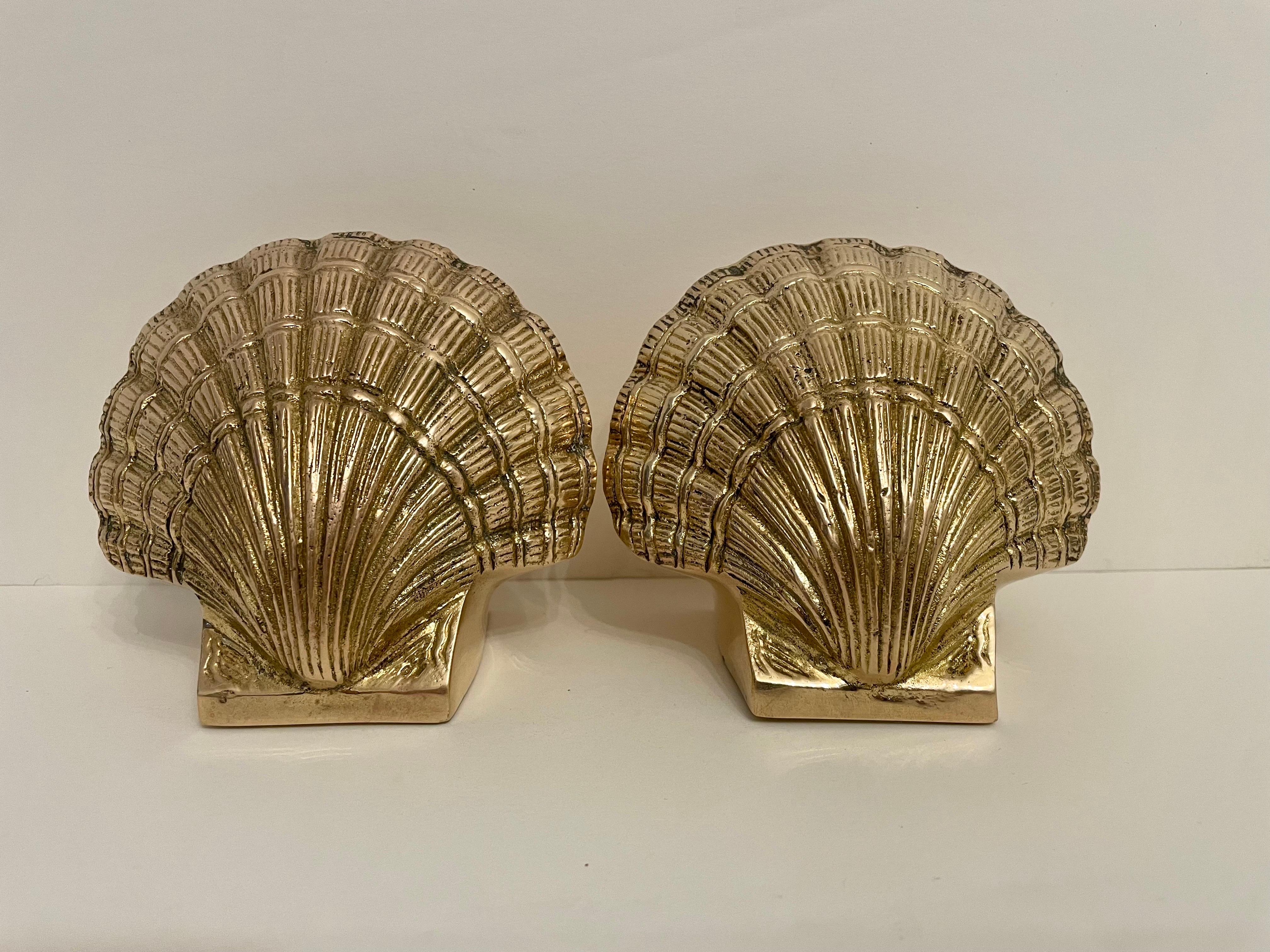 Pair brass scallop or clam shell seashell bookends. Very good detail to the casting. Good condition. Any dark spots are reflection only. Hand Polished, ready to use.