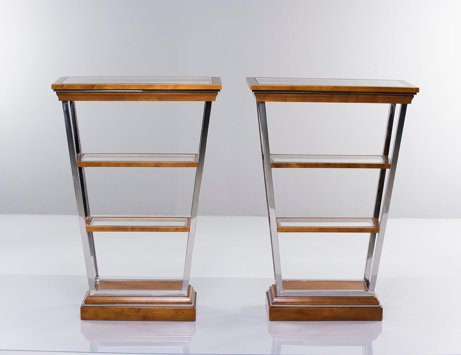 Pair of Brazilian four shelf étagères in V-Form with chrome trim, glass insert shelves and teak frames. Unknown maker. Very good vintage condition. Sold and priced as a pair, circa 1960s.