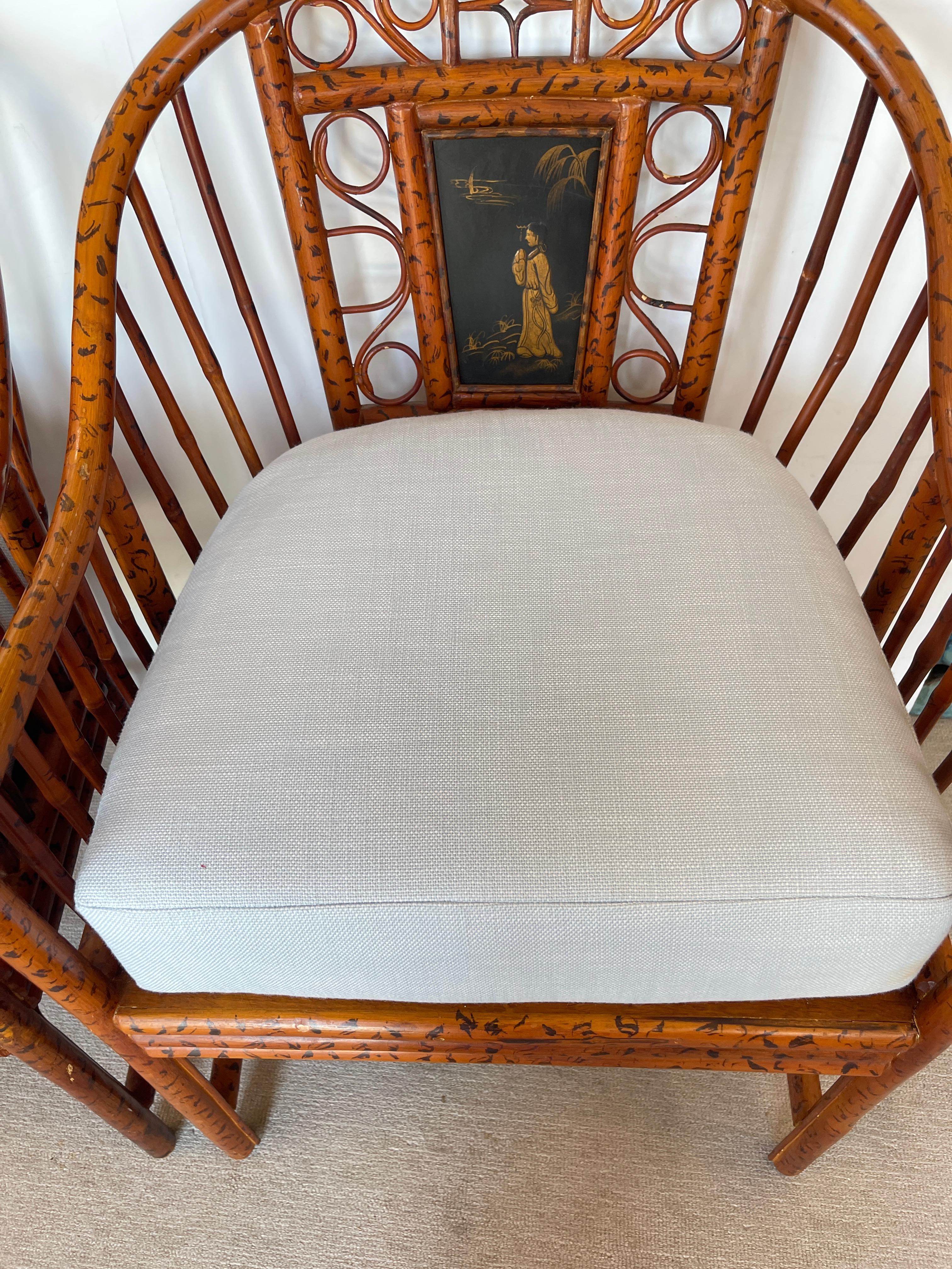 Just in this A pair of late early 20th century bamboo open armchairs in the Brighton Pavilion Taste each with an inserted black and gold lacquered figurative panel.
New French Pale Blue Cushions.
The seats are with cane, in very good condition.
Very