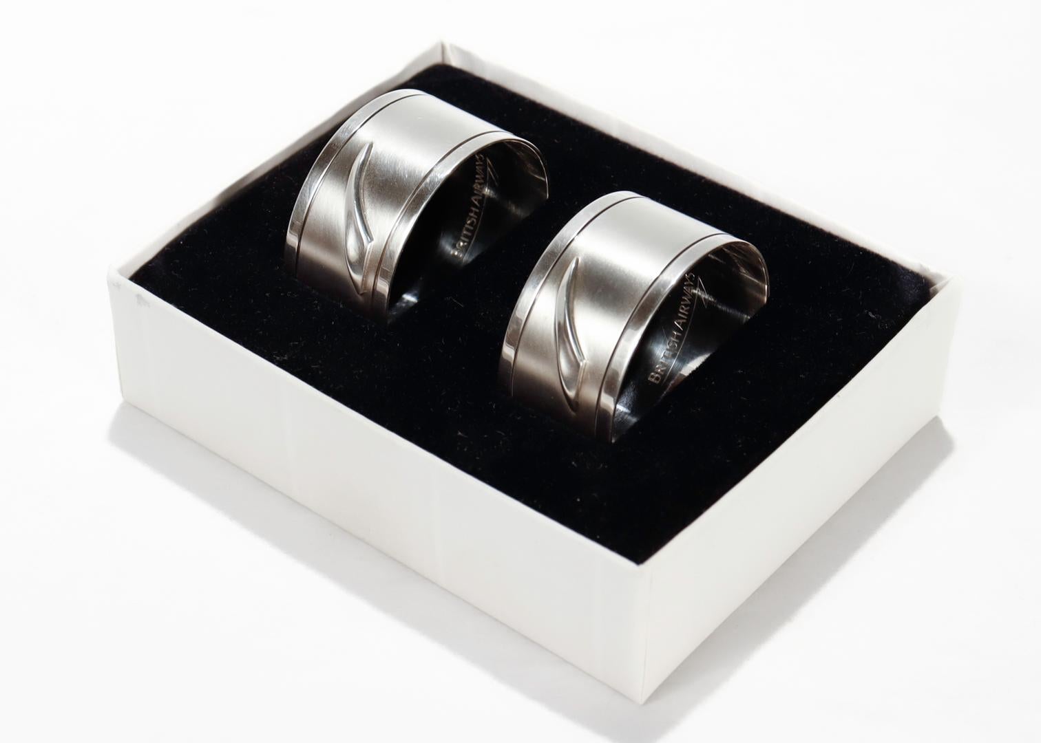 A fine pair of English sterling silver napkin rings.

Made for the Concorde supersonic airliner division of British Airways.

Fully hallmarked to the back British Airways / London / Sterling / 1992

Simply a wonderful pair of collectible Concorde