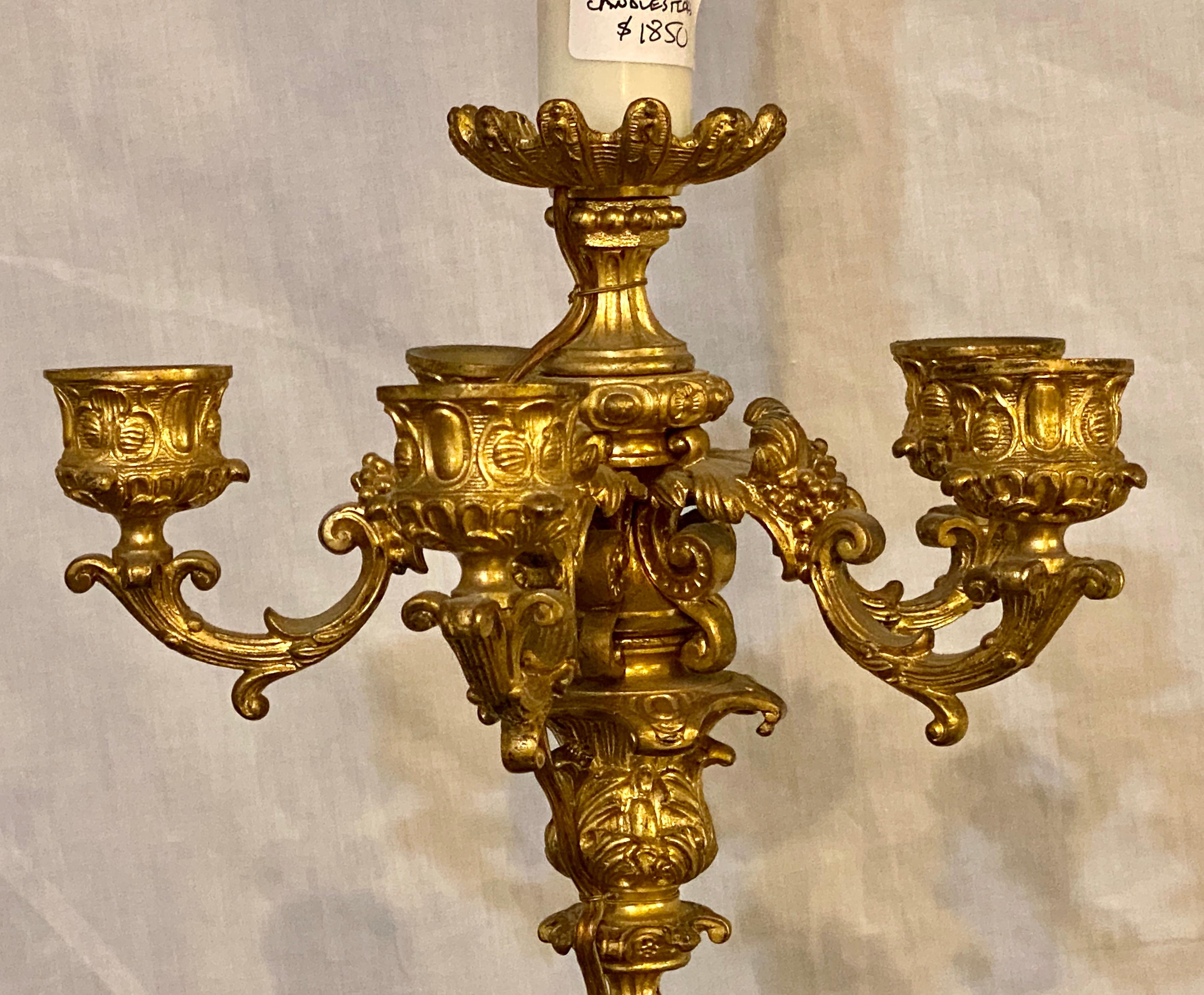 Pair of Bronze 1920s Electrified Candelabra Lamps, Full Figure Fluted Cherubs In Good Condition In Stamford, CT