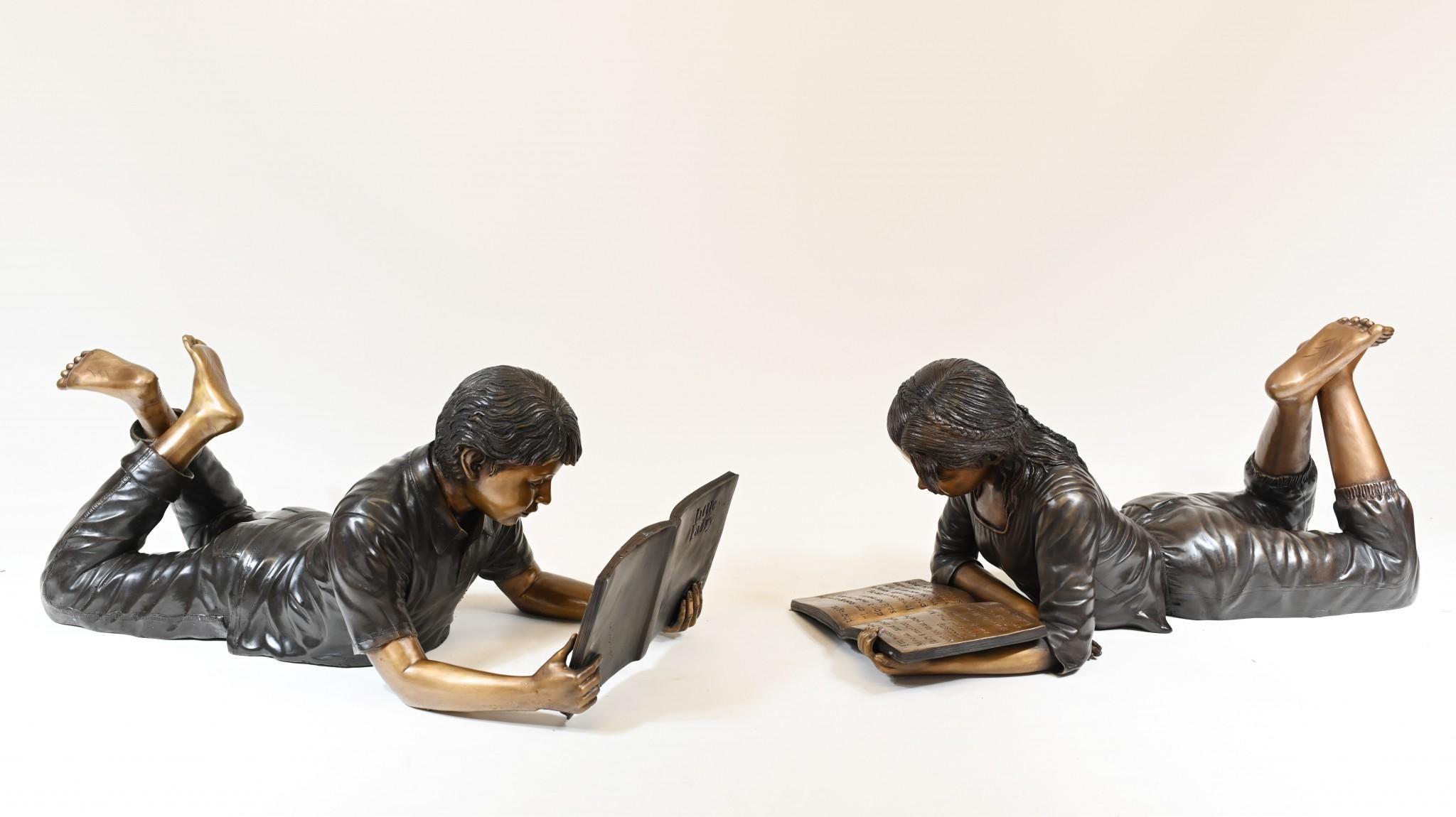 Gorgeous pair of bronze children statues
Boy and girl each depicted lying down ready a book
Boy is reading 'Little Fairy'
Great pair of statues, would work outside so good on the lawn
Of course being bronze these can live outside with no fear of