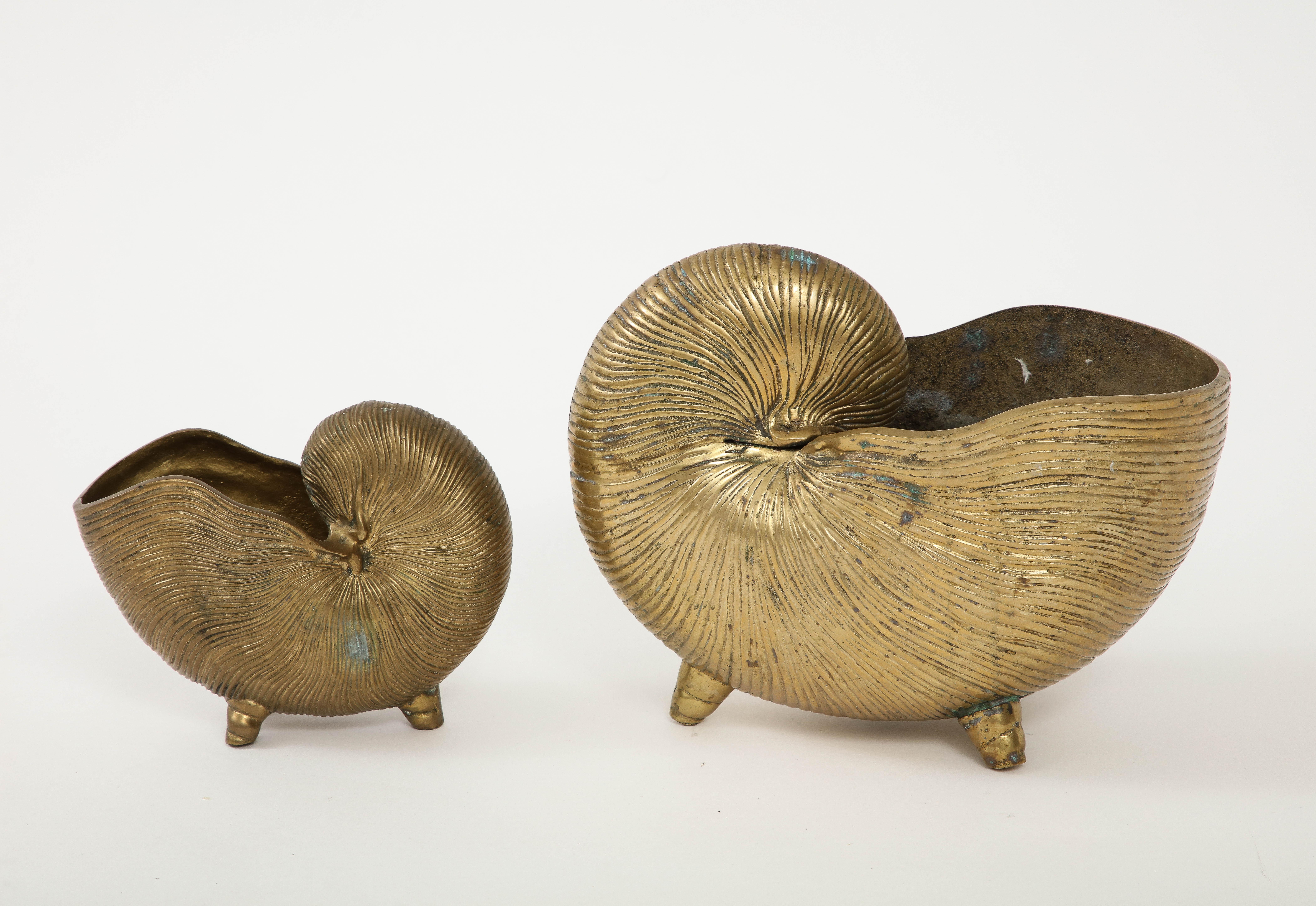 Pair of heavy aged bronze stylized nautilus shell planters in the style of Tony Duquette. C 60s.