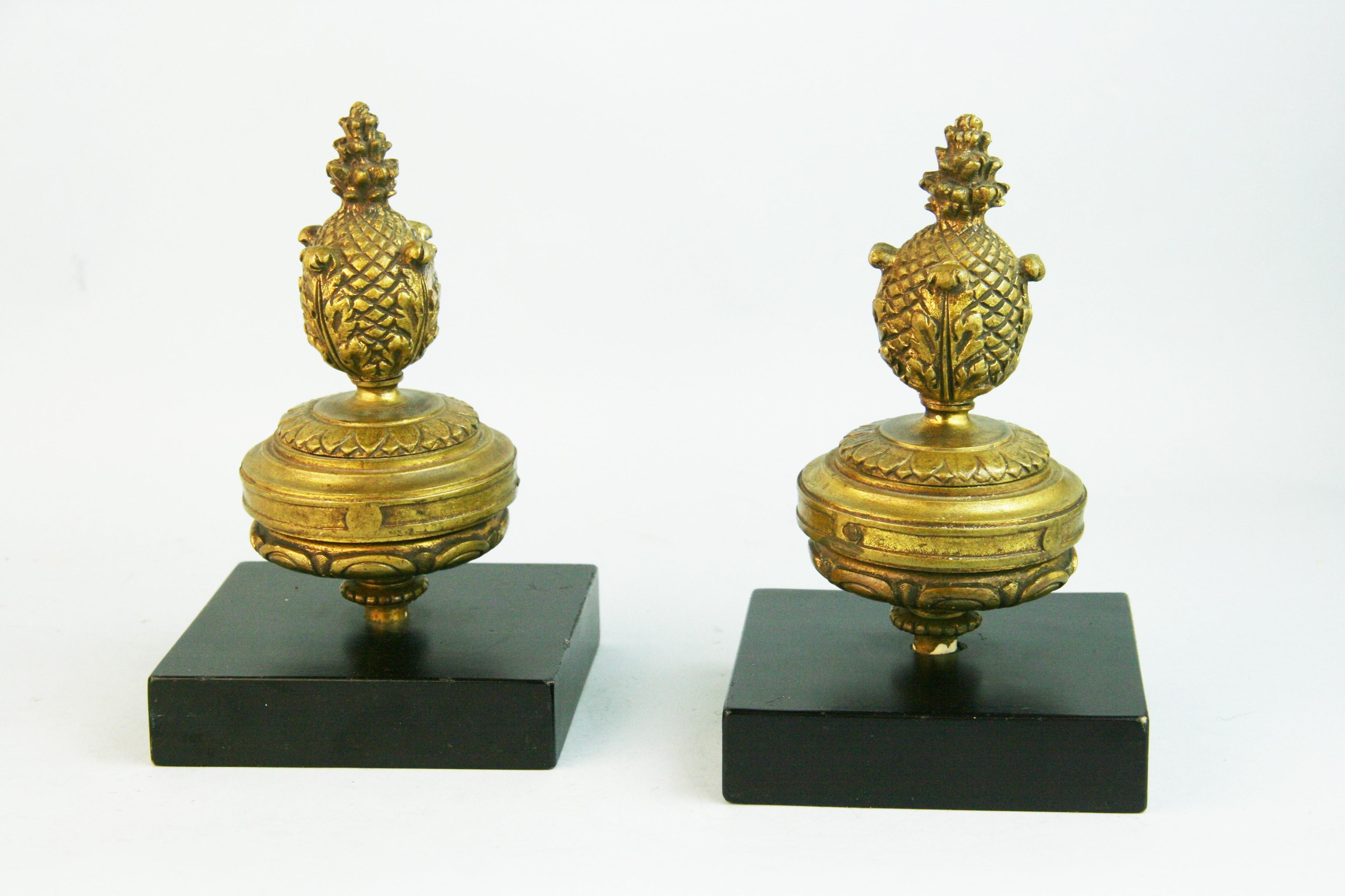 1192 Pair cast bronze finials bookends (1920's) later set on a wood block.
Finials 3.25