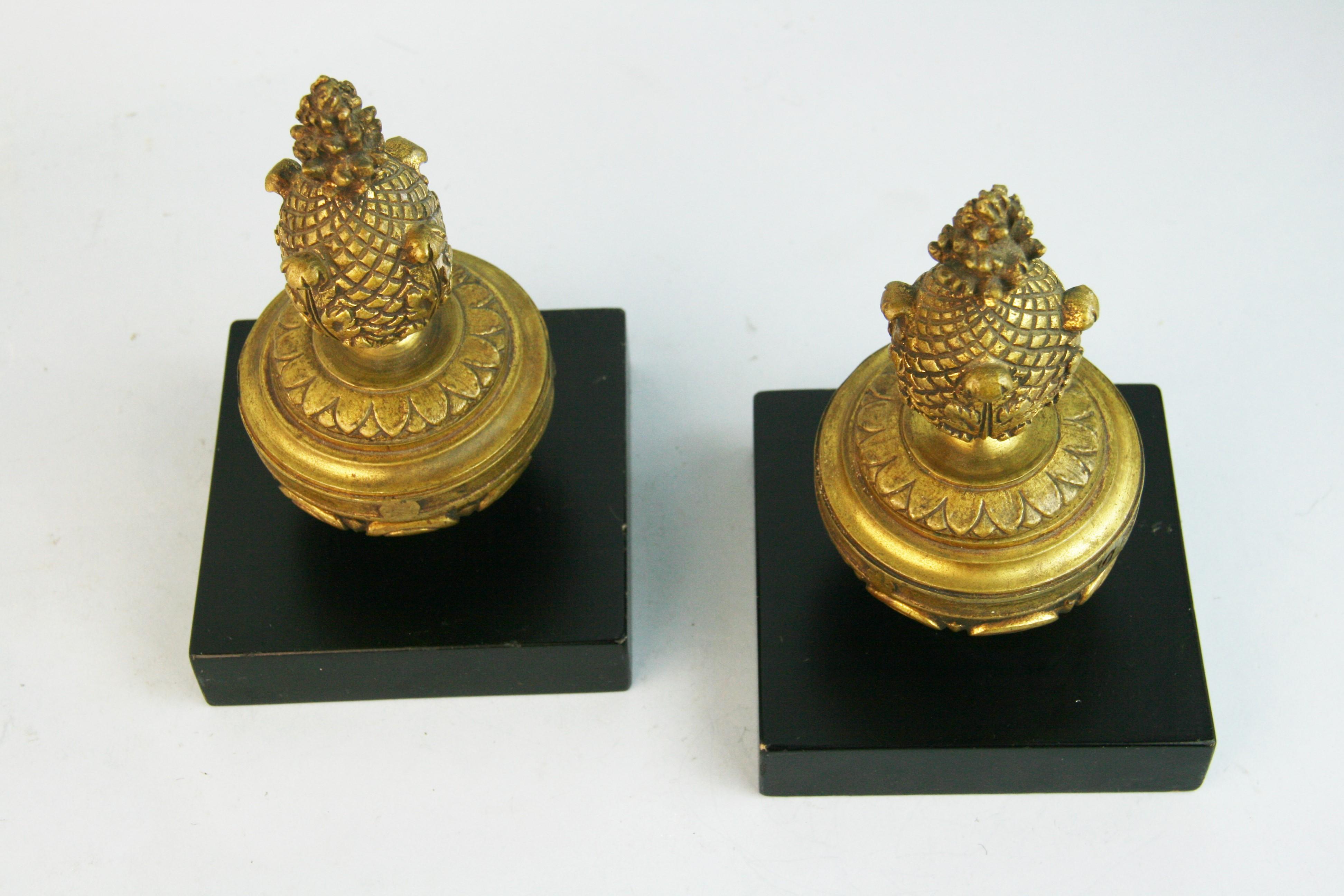 Early 20th Century Pair Bronze Finial Bookends Set on Wood Block For Sale