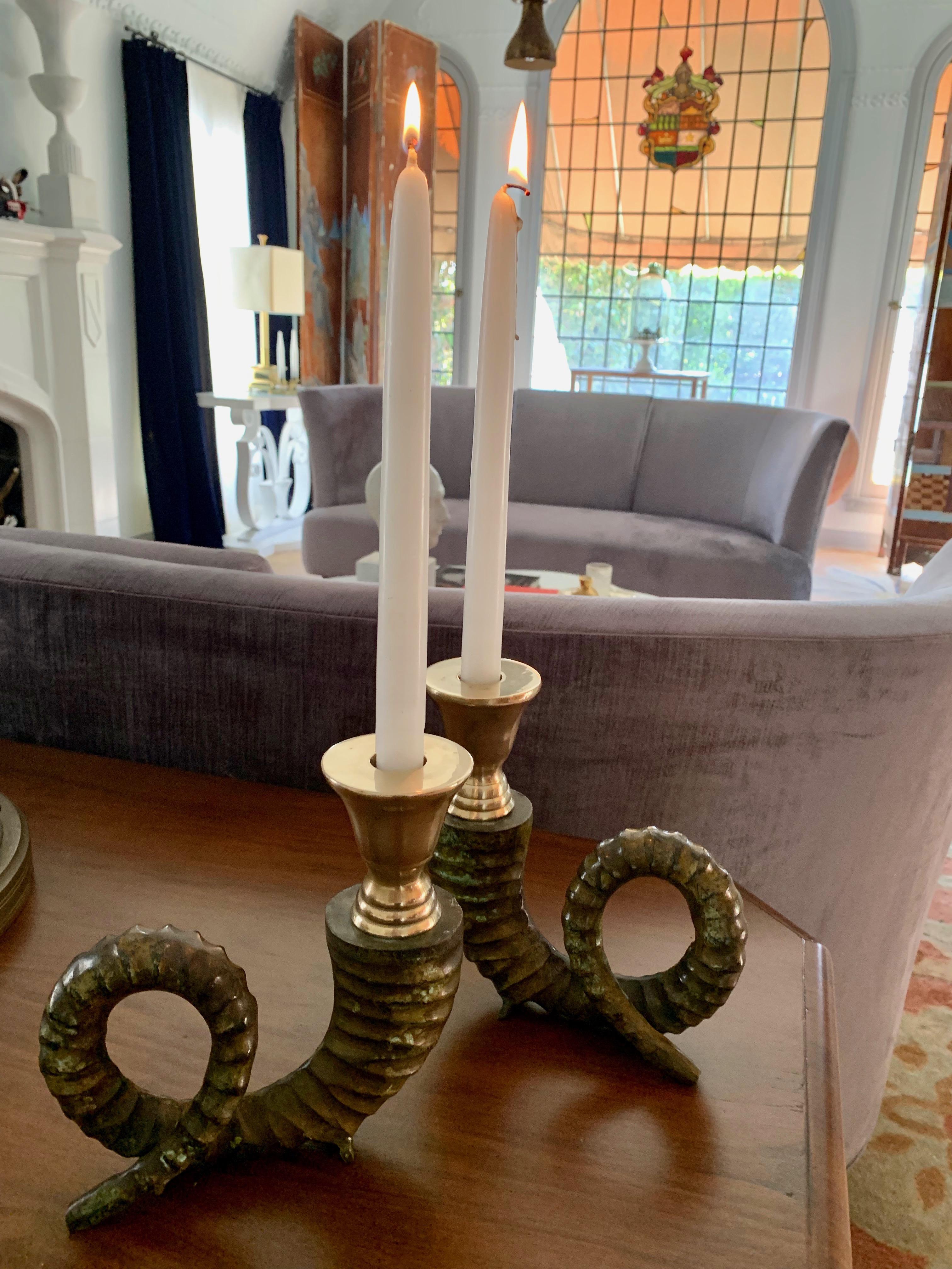 Pair bronze horn and brass candlesticks, a remarkable and handsome pair of horns made of cast bronze and finials in solid brass... a compliment to any dining table, mantle or console. Unique and sophisticated.