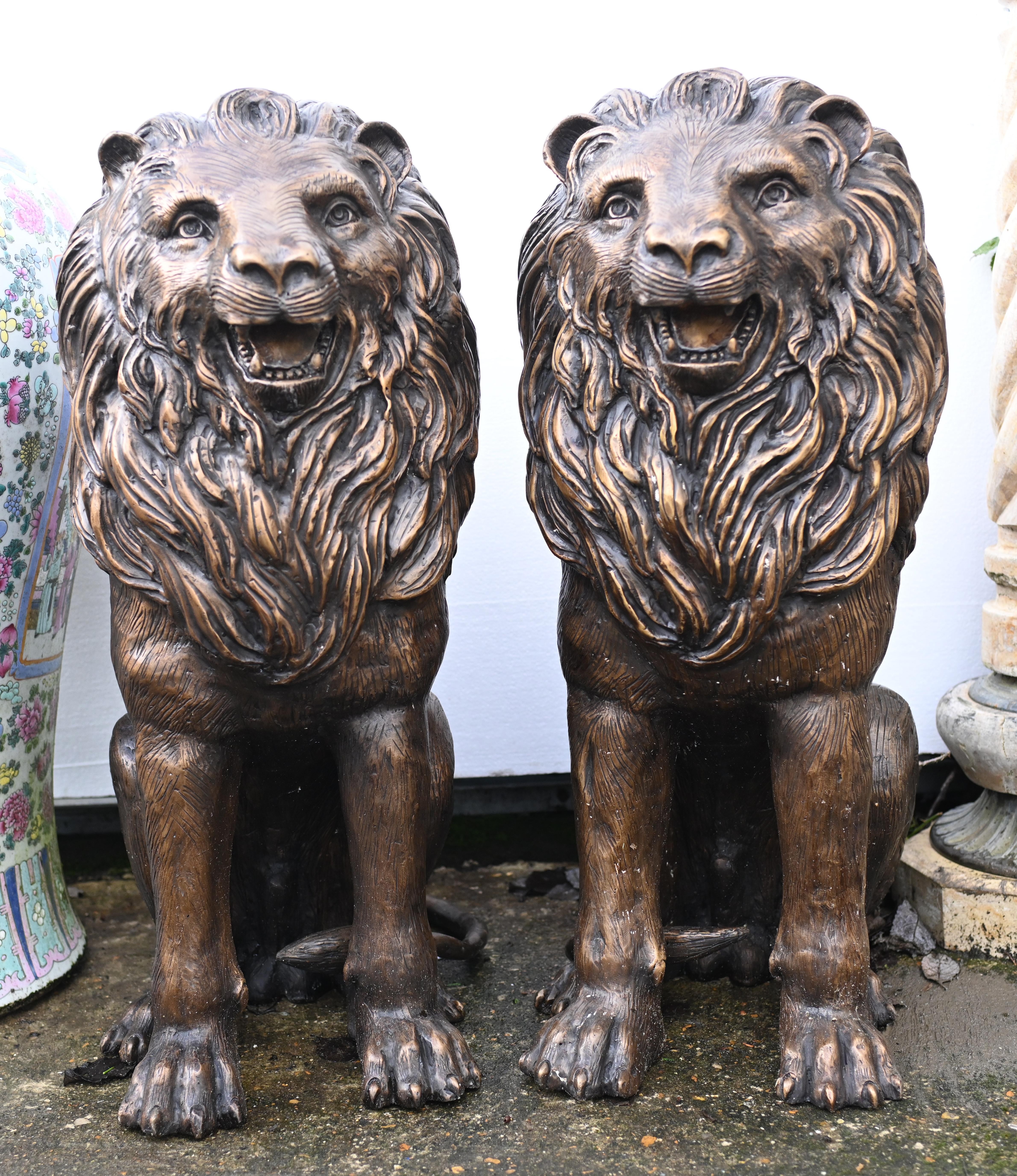 You are viewing an impressive pair of large English bronze lion gatekeeper statues. I hope the photos do this stunning pair some justice, they're certainly more impressive in the flesh.
The lions remind us of the famous ones found in Trafalgar