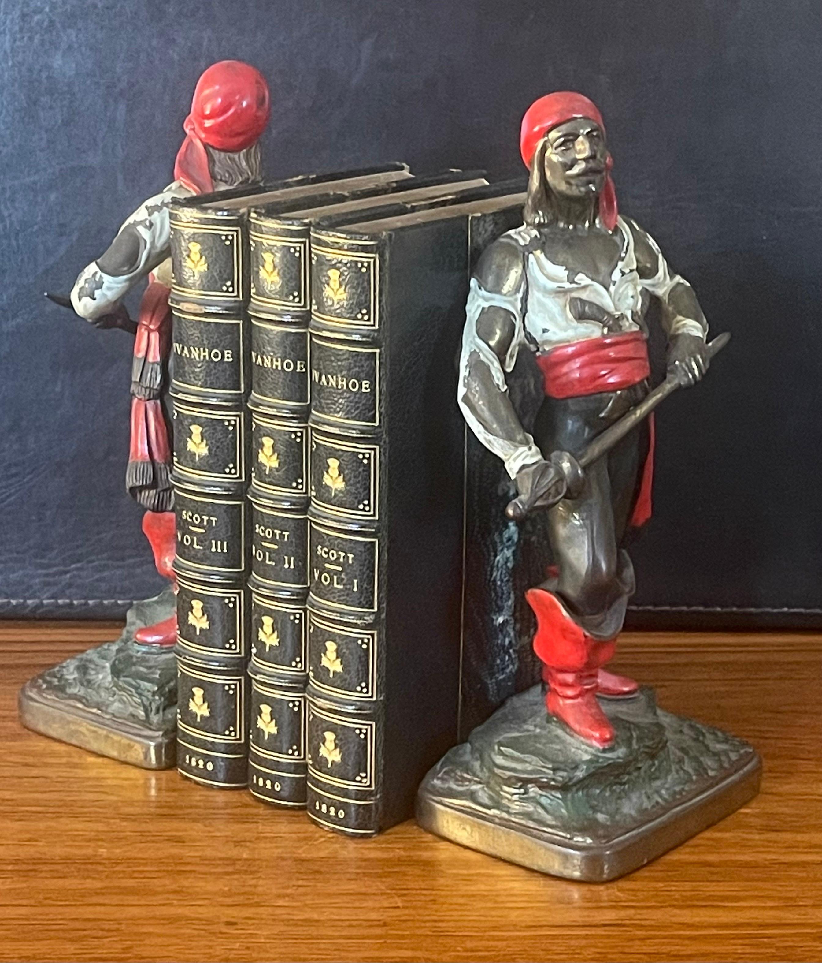 Art Deco Pair Bronze Patinated Polychrome Pirate Bookends by Pompeian Bronze For Sale