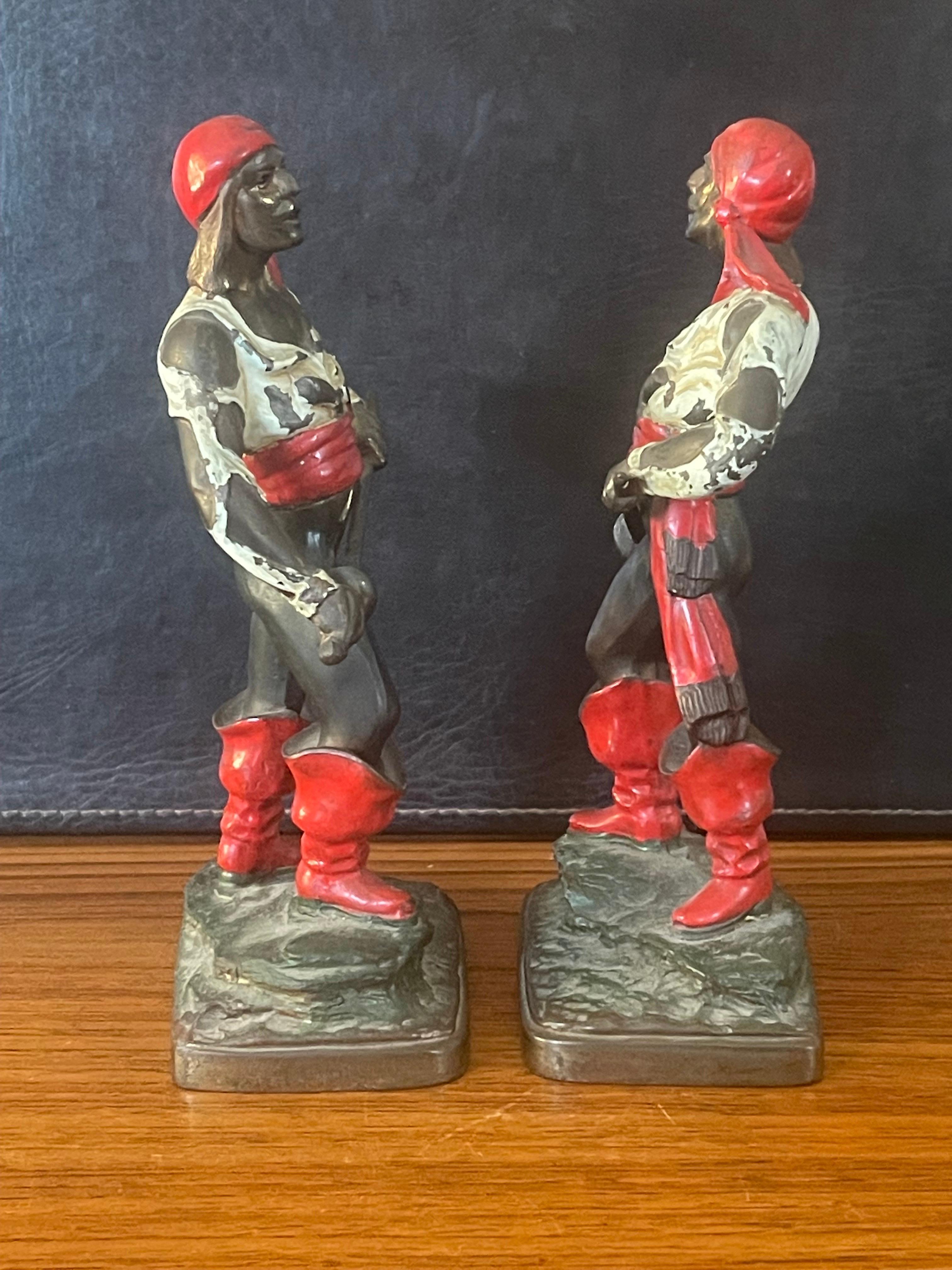 20th Century Pair Bronze Patinated Polychrome Pirate Bookends by Pompeian Bronze For Sale