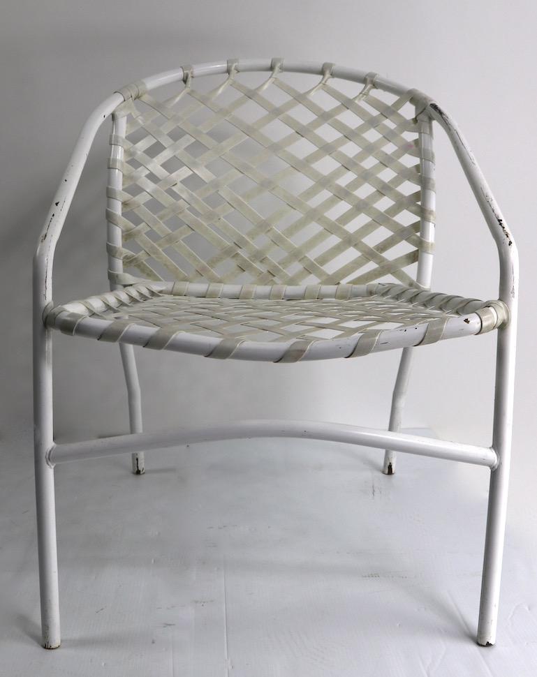 Nice pair of dining height patio, poolside, or garden chairs designed by Tadao Inouye for Brown Jordan, circa 1960s-1970s. The aluminum frame construction creates a strong and sturdy frame while still being surprisingly light and easy to move