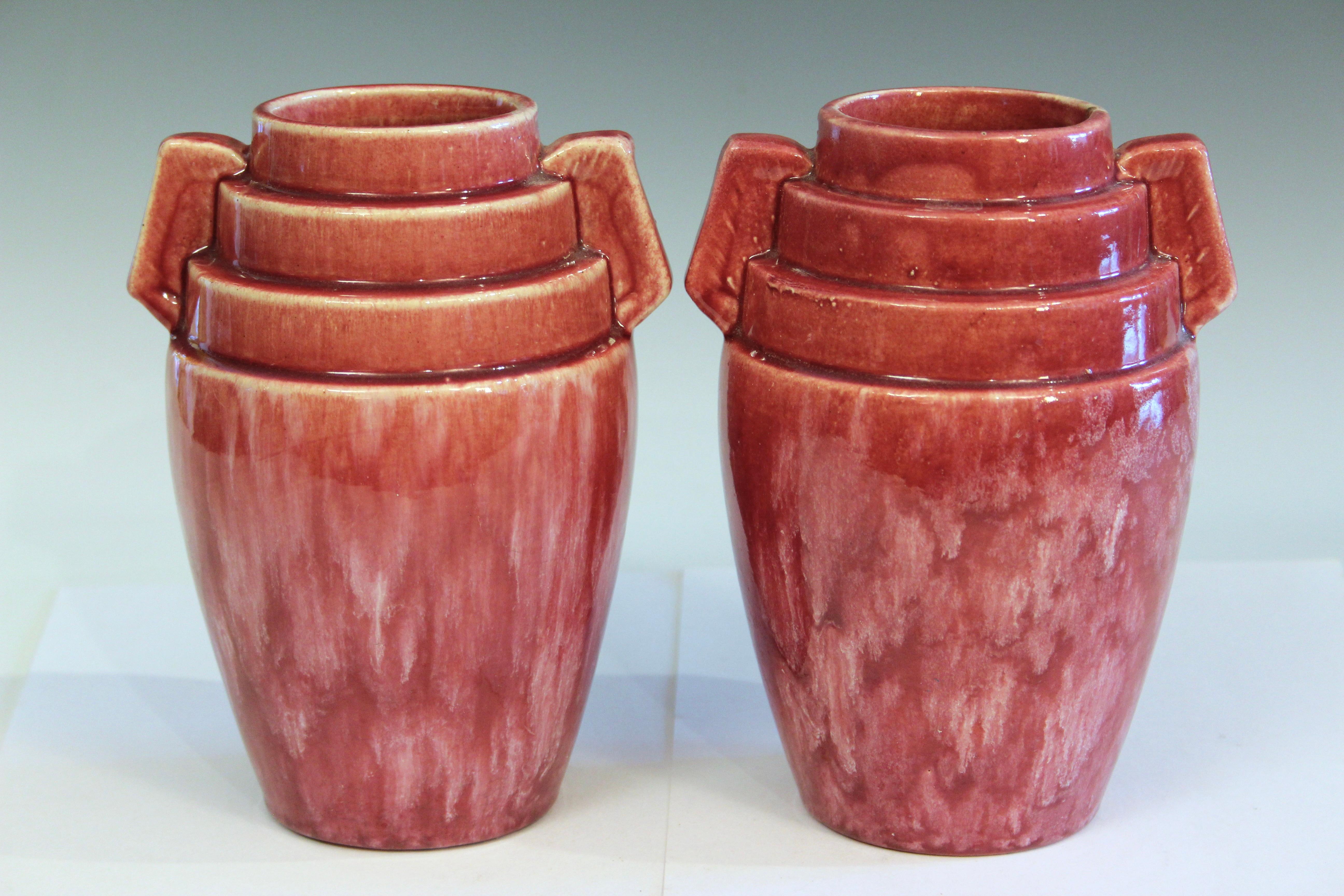 
Pair old vintage Brush McCoy Art Deco Kolorkraft Moderne rocket vases in mottled burgundy glaze, circa 1930. 7 1/2