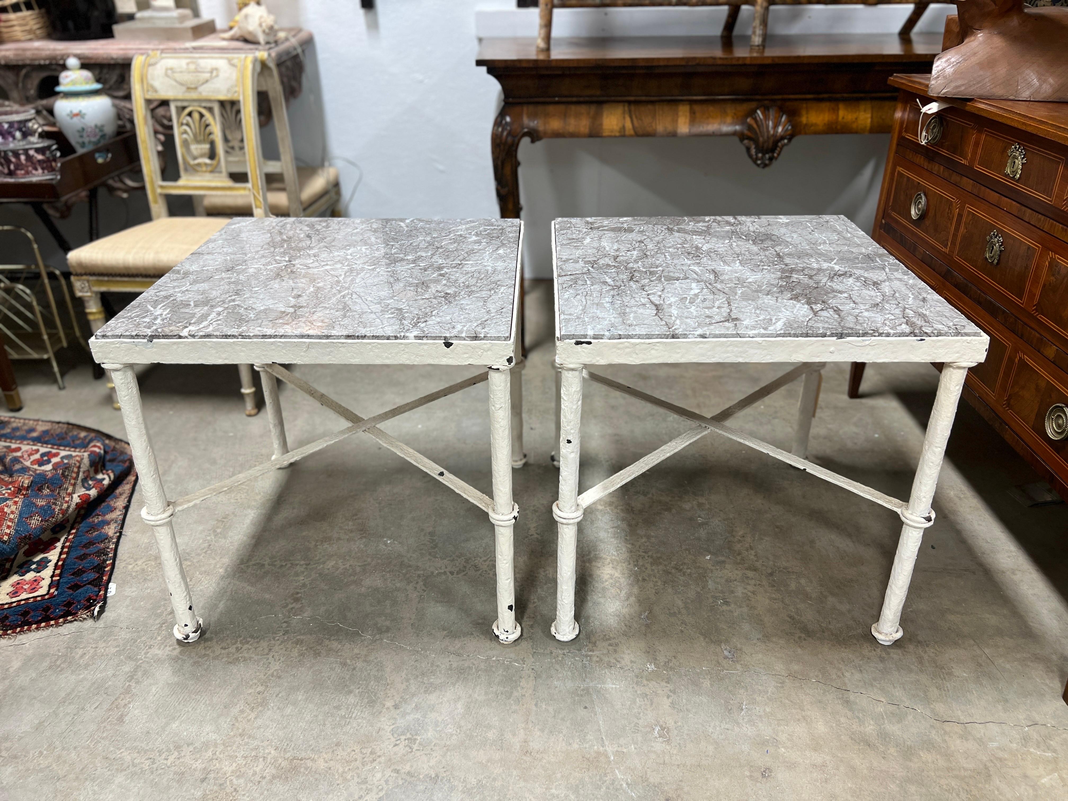 Style of Diego Giacometti (Swiss, 1902-1985). 

This very fine quality side tables are constructed with a solid HEAVY iron frame which is accented by faux rope straps to the legs and a x-form cross bar. The tables which are of square form also have