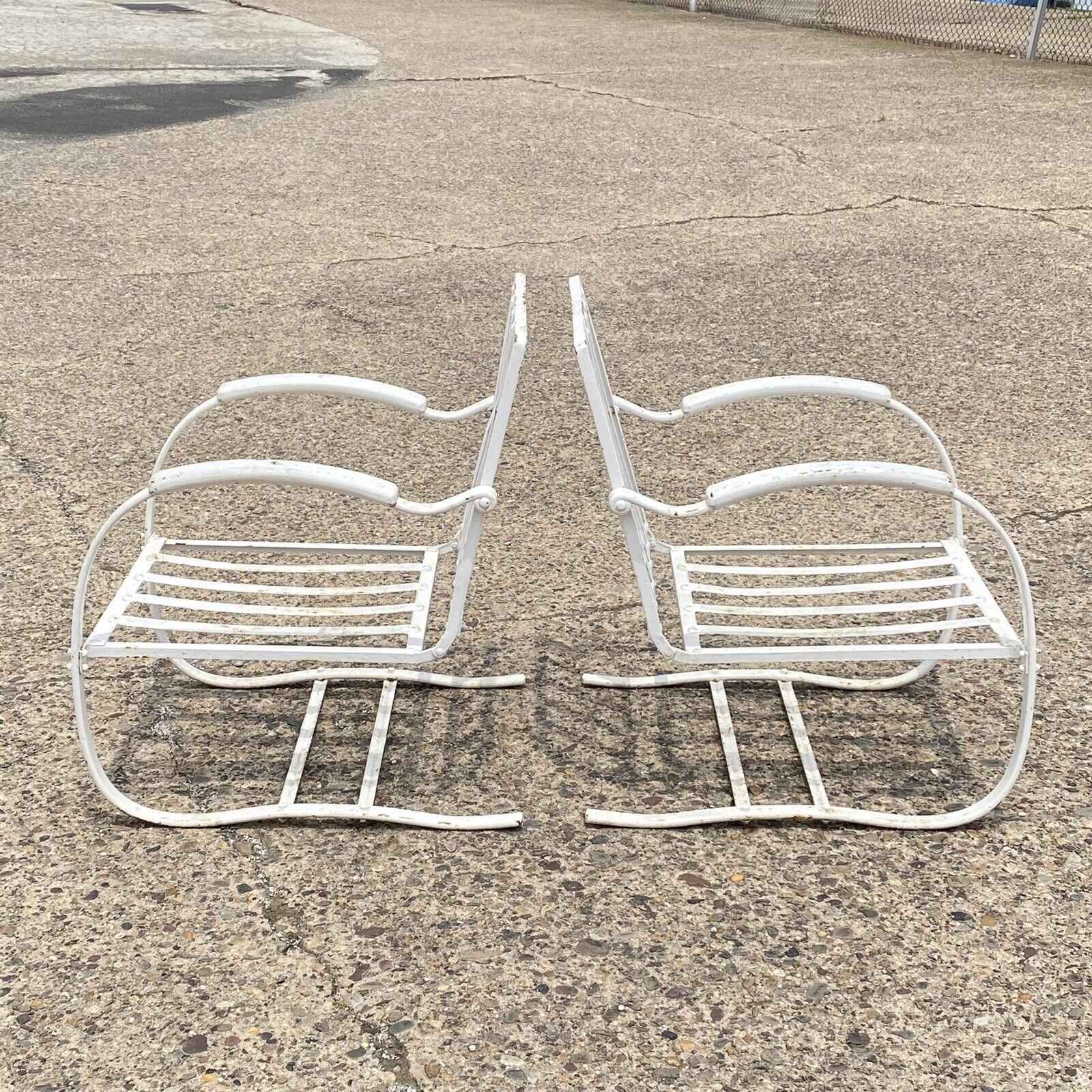 Vintage Bunting Glider Co Sculptural Art Deco White Iron Outdoor Patio Springer Lounge Chairs - a Pair. Circa  Mid 20th Century. Measurements: 33