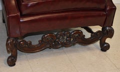 Pair Burgundy Wing Back Club Chairs Heavily Carved Walnut Frame