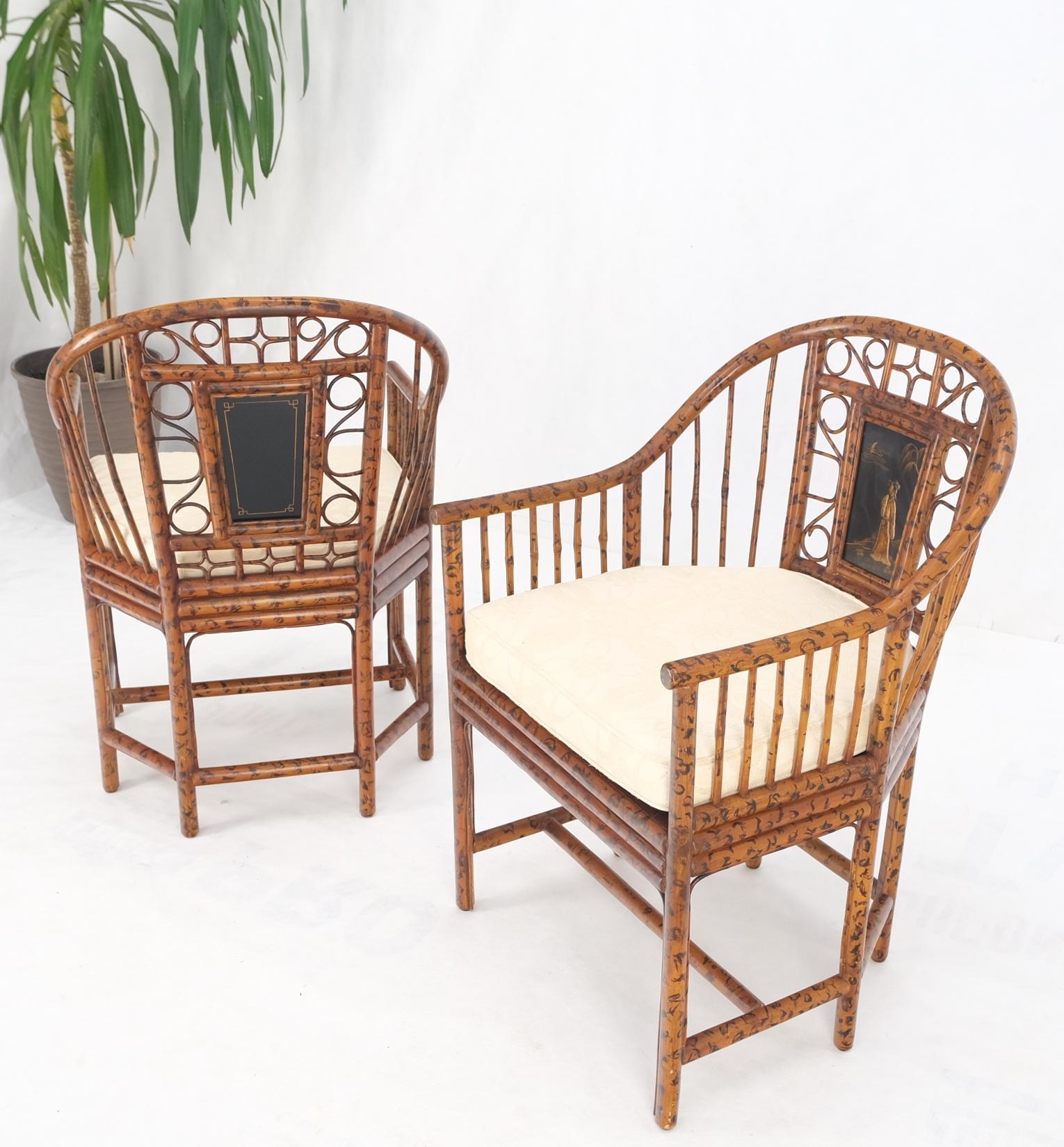 Pair burnt bamboo Asian motive plaque decorated lounge fireside chairs cane seat.