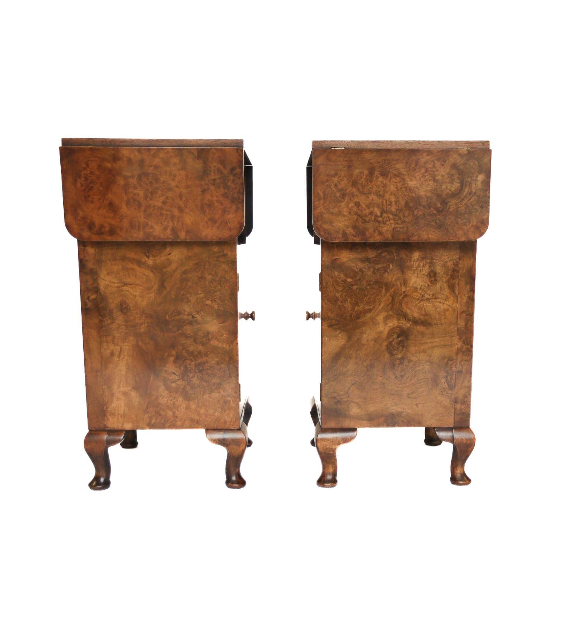 Pair Queen Anne Style  Burr Walnut Drop Leaf Bedside Cupboards
Circa 1930s,
Drop Leaf tops with pull-out slides each side 
to support the tops, 
Open Compartment at top, 
Single at Base, 
Each sitting on 4 Squat Cbriole shaped legs
Recently
