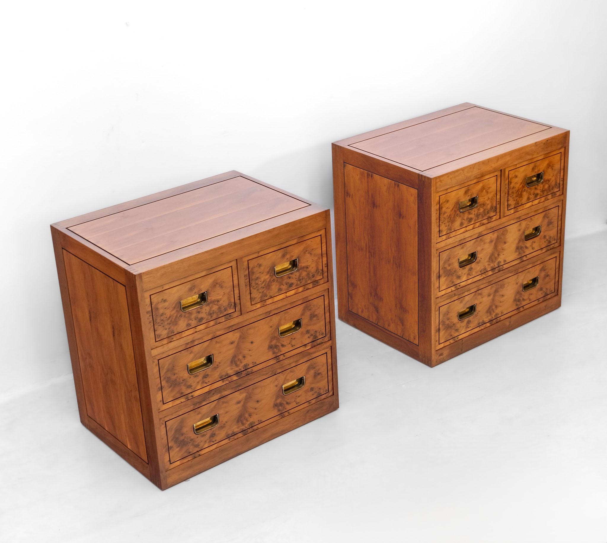 Pair of burr yew and yew bedside chests with recessed brass handles, designed by Ray Leigh for Gordon Russell Ltd. December 1988.

These chests were made for Ray Leigh by craftsman M Hubbard. They come with Leigh's personal drawing plans for the