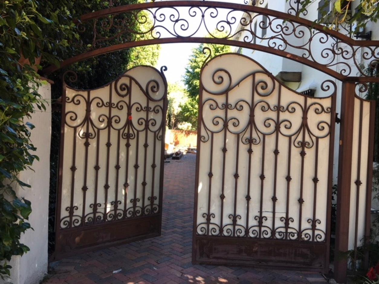 Spanish Colonial Pair C 1920's Hand Forged Wrought Iron Driveway Gates From Beverly Hills Estate For Sale