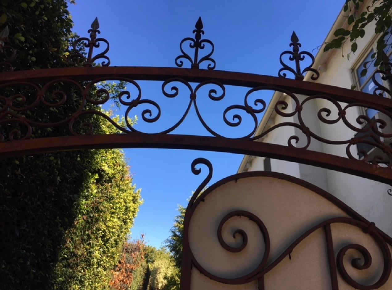 Hand-Crafted Pair C 1920's Hand Forged Wrought Iron Driveway Gates From Beverly Hills Estate For Sale