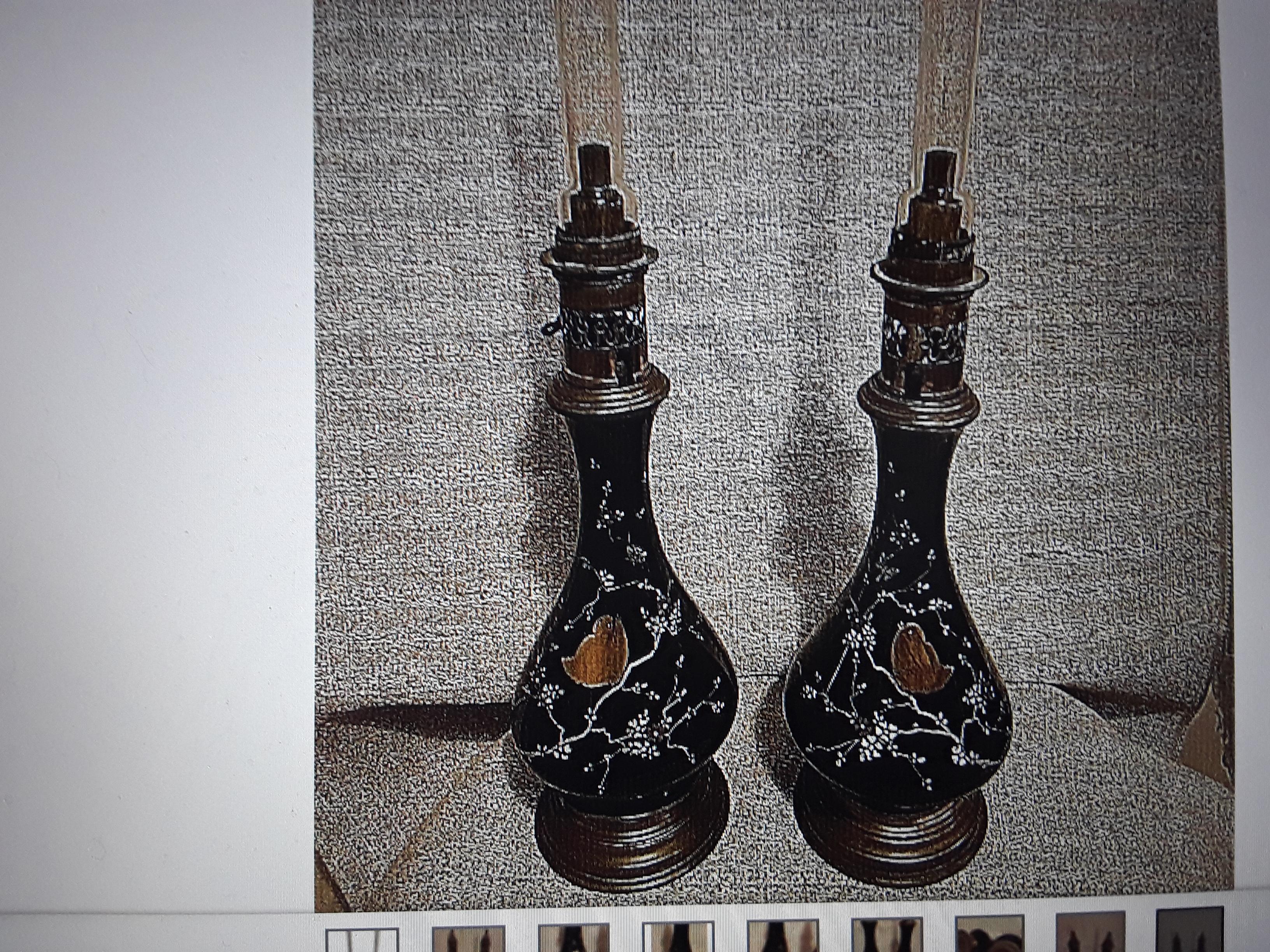 This is a very unique pair of lamps. Pair 1870's Russian Black Opaline Art Glass with Bird Decor and Foliage. These were oil lamps and they have not been modified to electric. An original pair of Russian Opaline Gas Lamps.