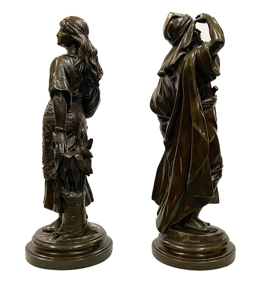 A good quality pair of 19th century bronze coated classical male and female Arab figures. Size: 19