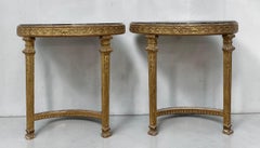 Coppia di consolle a mezzaluna in legno dorato del XIX secolo con piano in marmo, stile Luigi XVI rivisitato