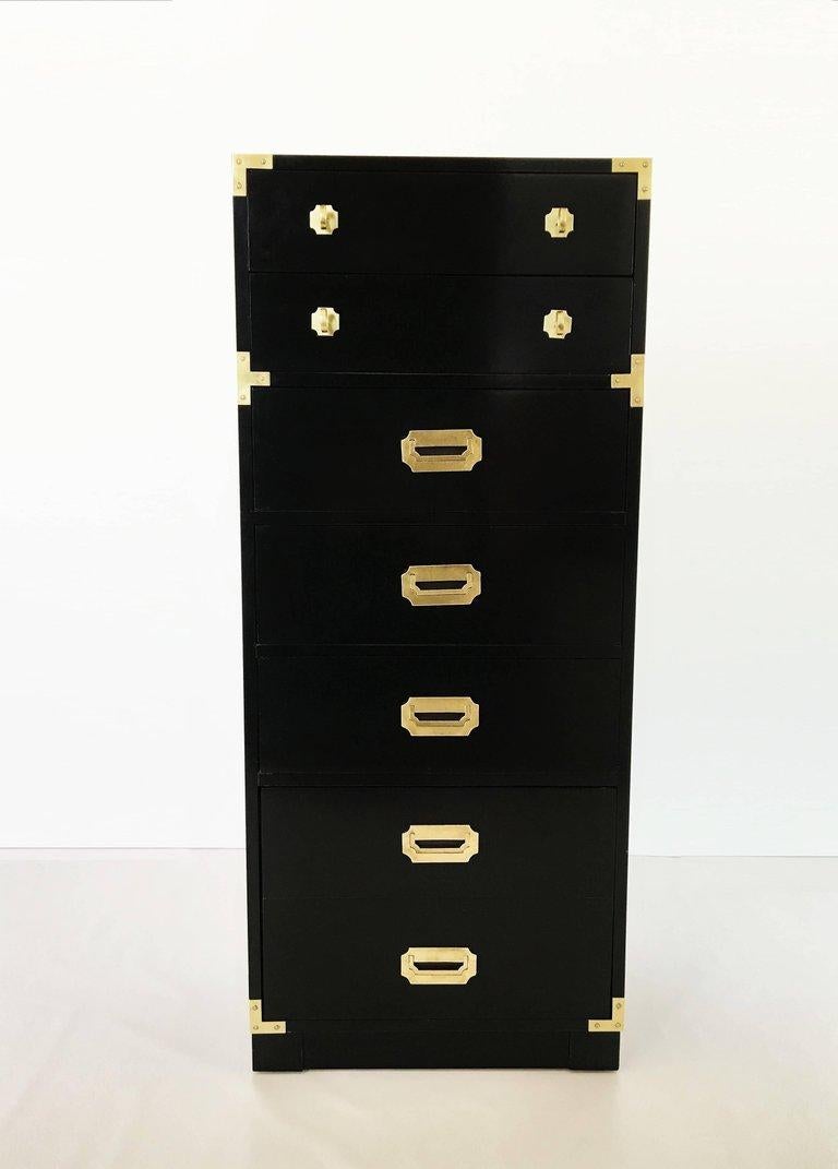 Two matching professionally lacquered in black Campaign tower chests. Expertly crafted and well made. Each conforming case features seven equal sized dovetail joinery drawers; five drawers each with recessed pull handles, two top drawers with four