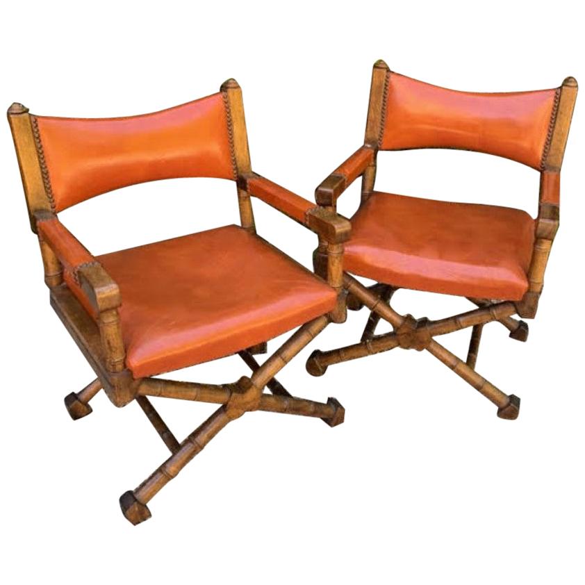 Pair of Campaign Style Leather and Wood Chairs