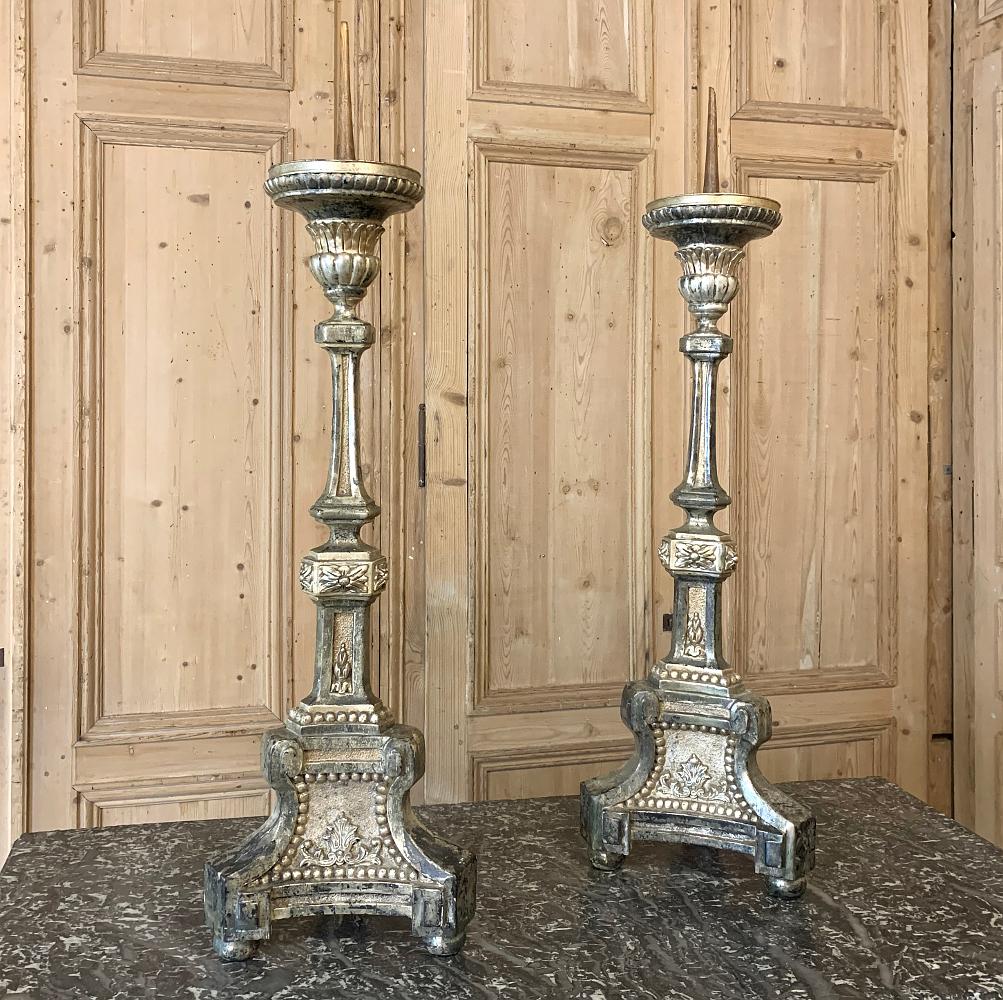 Pair of 18th century Italian neoclassical polychrome candlesticks are perfect for adding an old world touch to the room, especially with the ambiance of flickering candlelight for a romantic evening,
circa 1760s
Each measures 41 H x 12 W x 7 D.