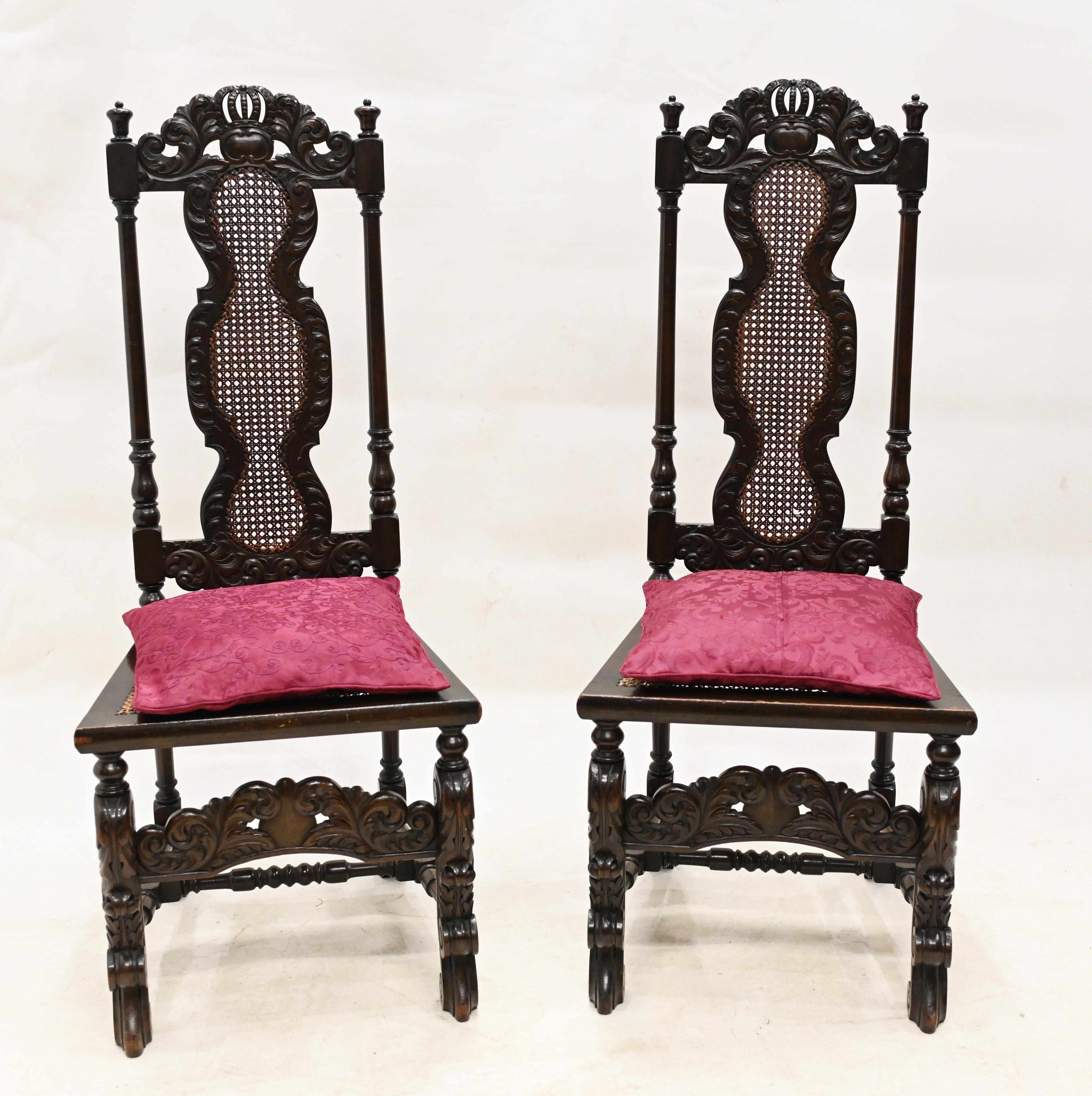 On trend pair of antique chairs in the Carolean manner
We date this pair to circa 1880 and they have a great farmhouse look
Feature raffia seats 
Hand carved details are very intricate and ornate
Bought from a private residence in London's