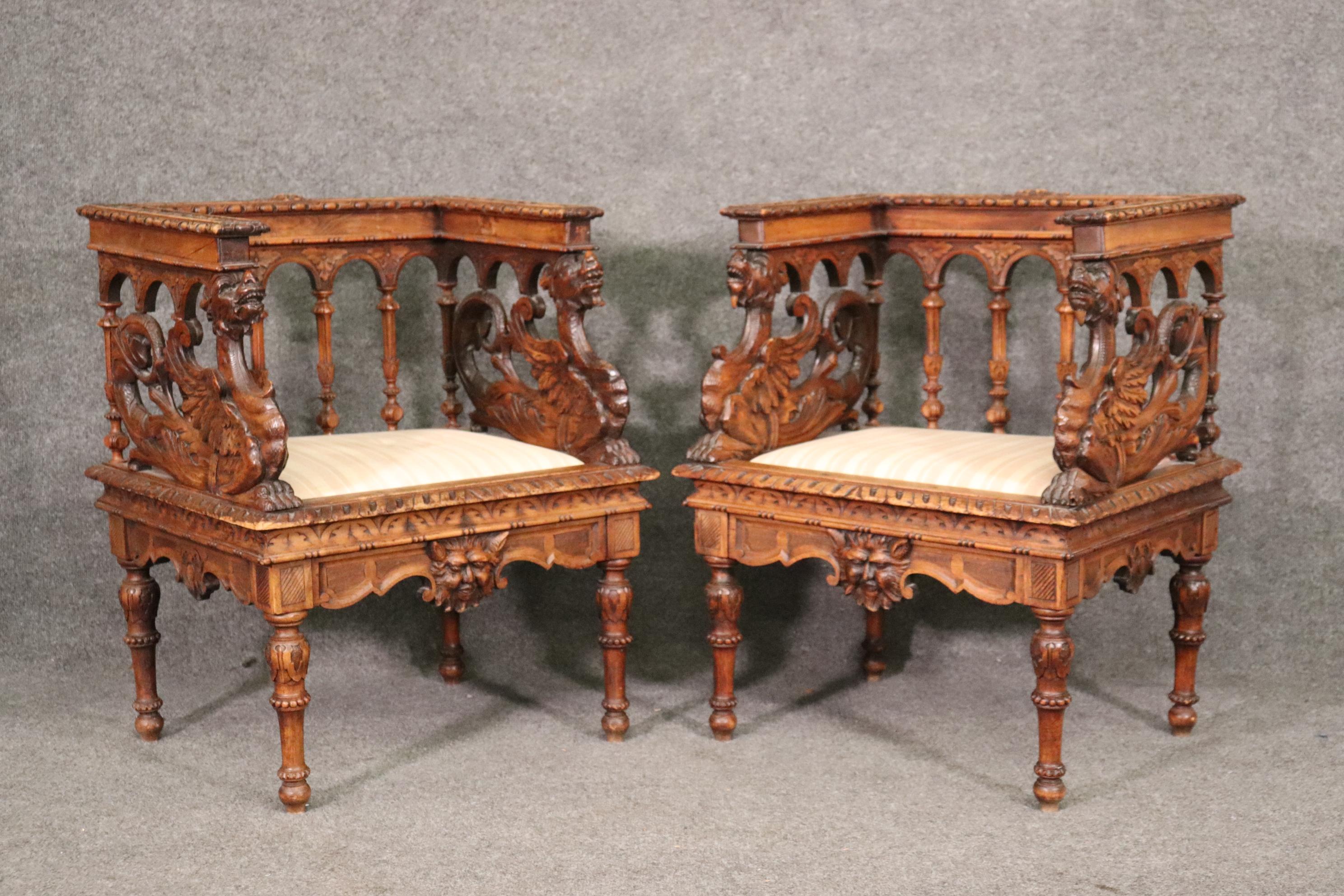 This is spectacular pair of carved walnut carved chairs with Griffins and the face of the Northwind. The carving is absolutely breathtaking and couldn't be done better which is why we attribute them to RJ Horner one of the best American makers that
