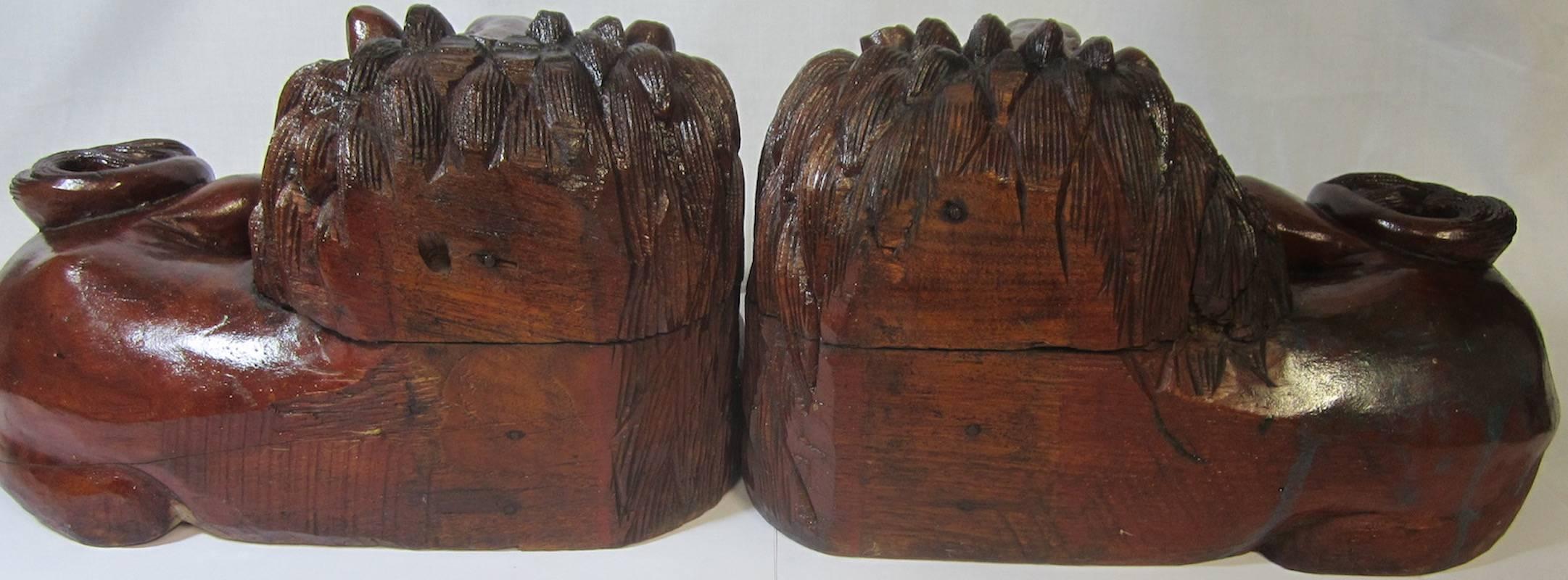 Pair of Carved Hard Wood African Lions For Sale 1