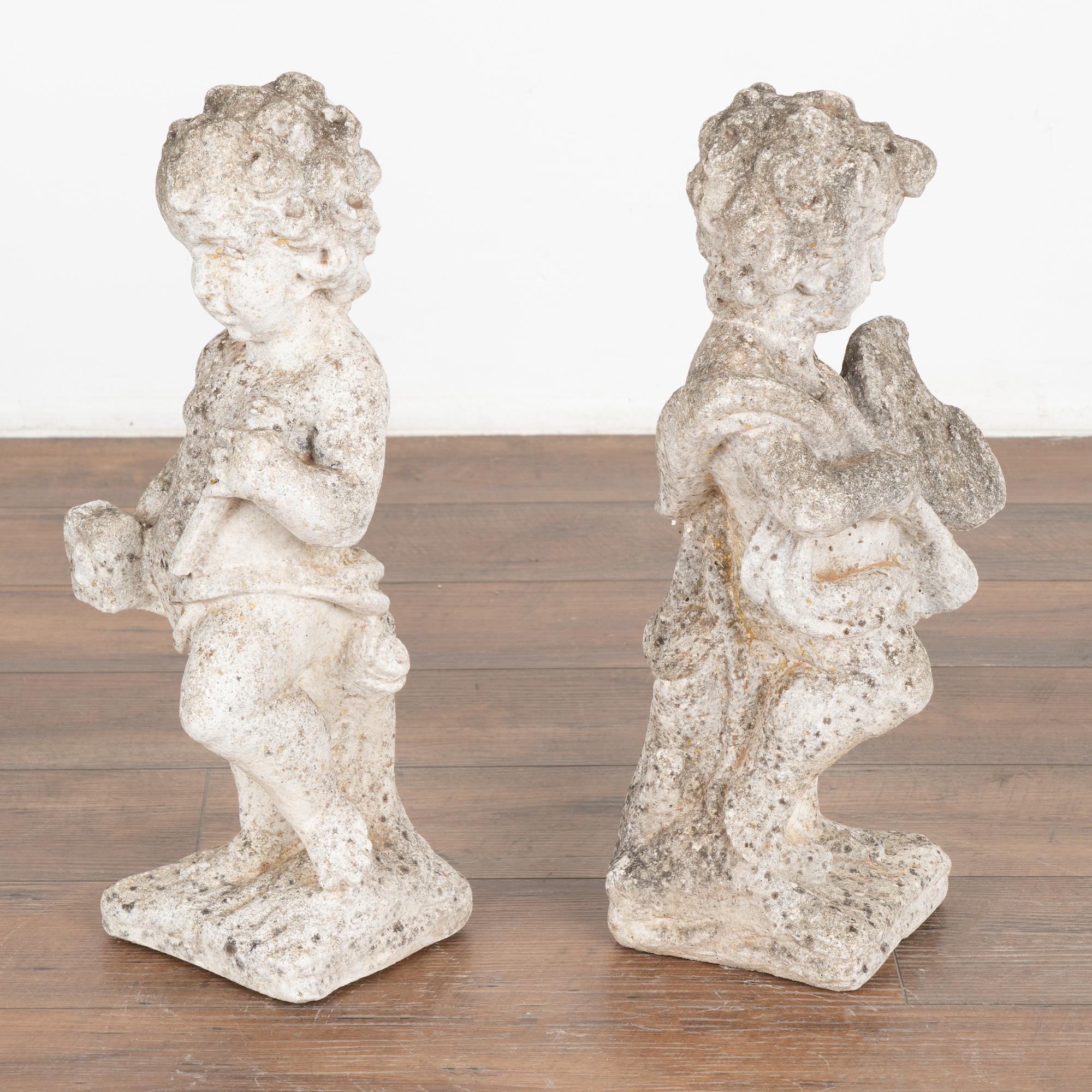 Neoclassical Pair, Carved Putti Garden Sculptures with Painters Pallet, Denmark circa 1920-40 For Sale
