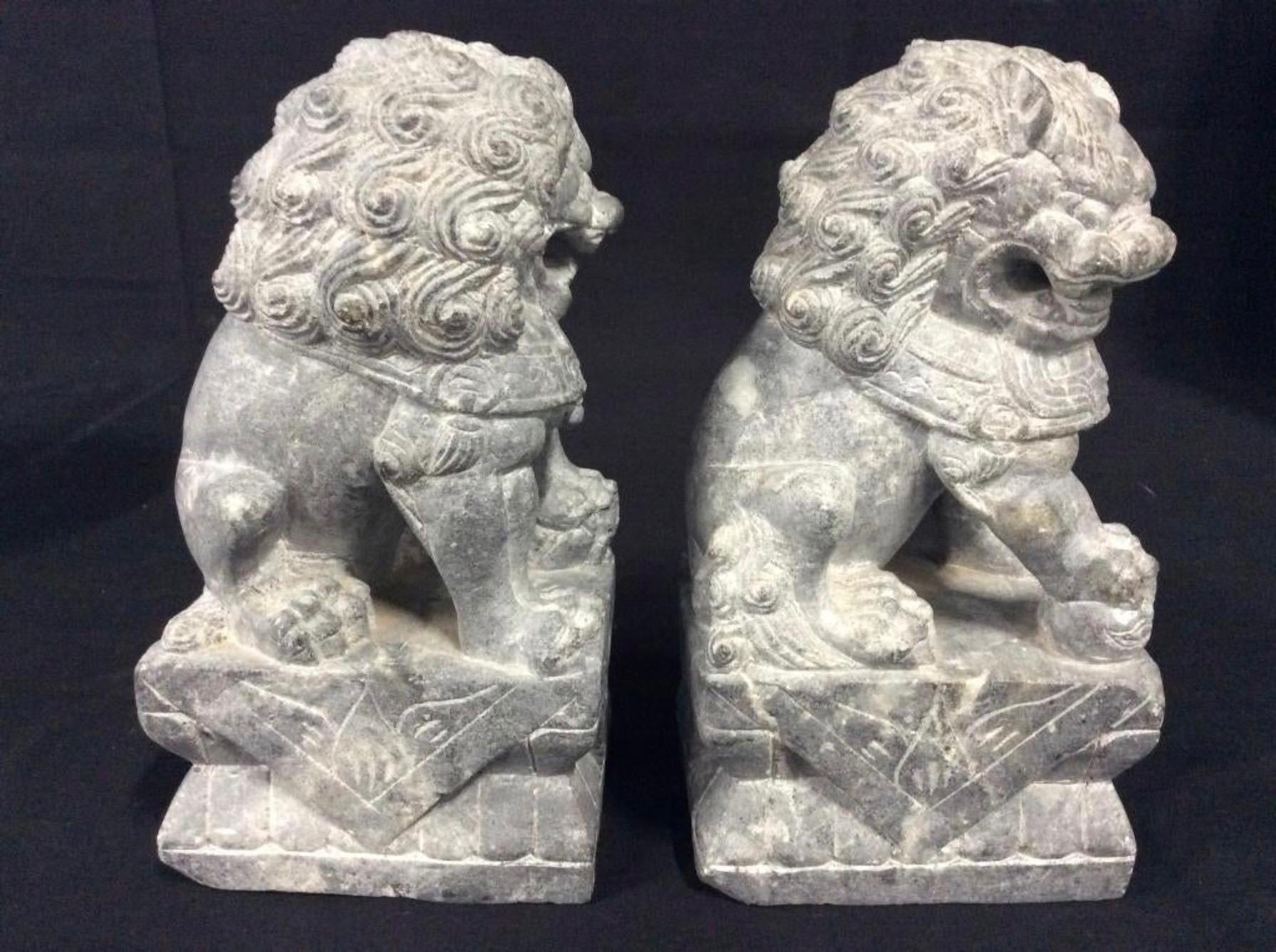 Chinese Pair of Carved Stone Foo Dogs