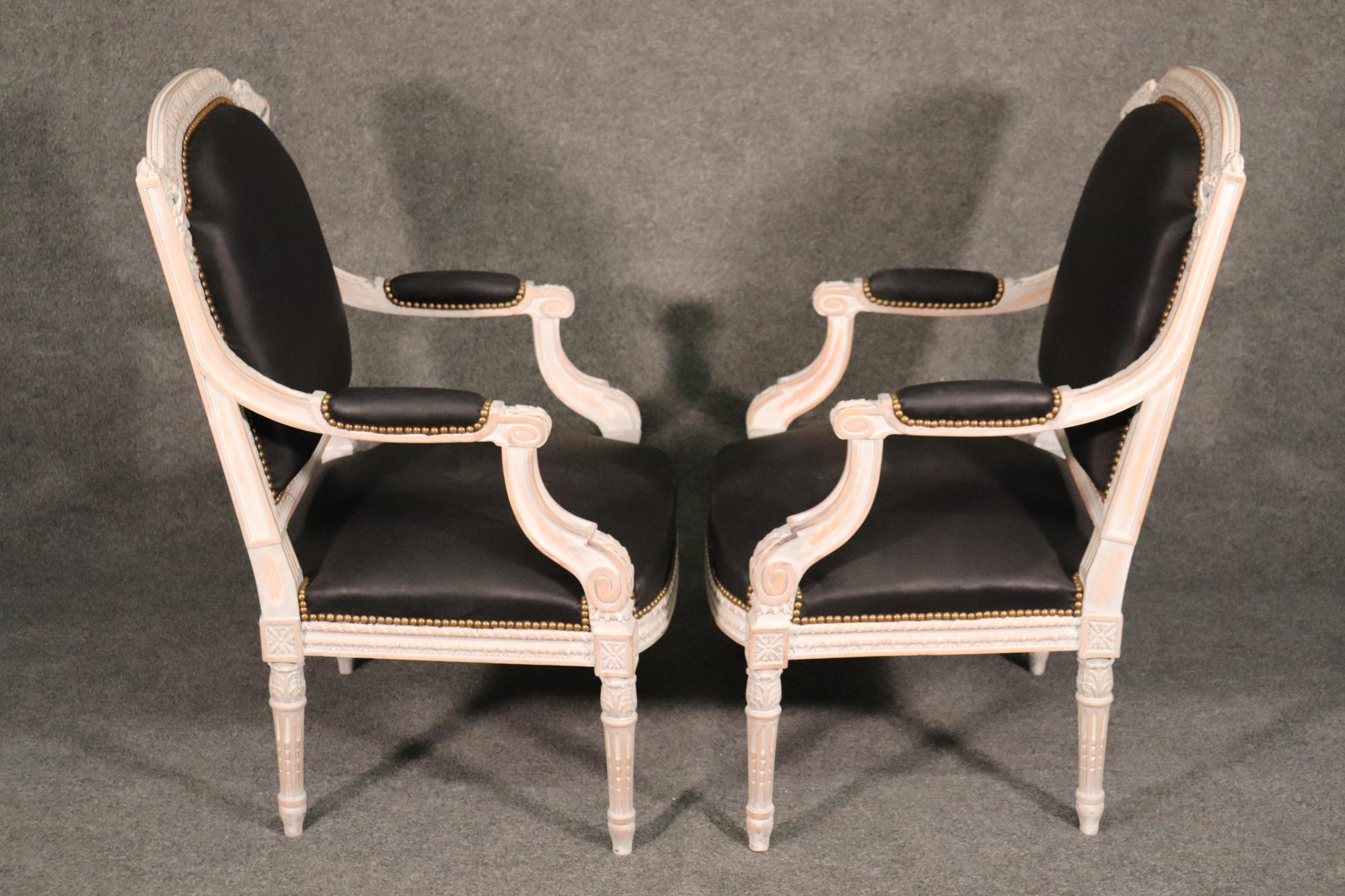 These leather upholstered chairs are an excersize in contrast and the power of black leather against a white background. The chairs are in very good condition and while not new, look fantastic. The chairs date to the 1980s and measures 40 tall x 26