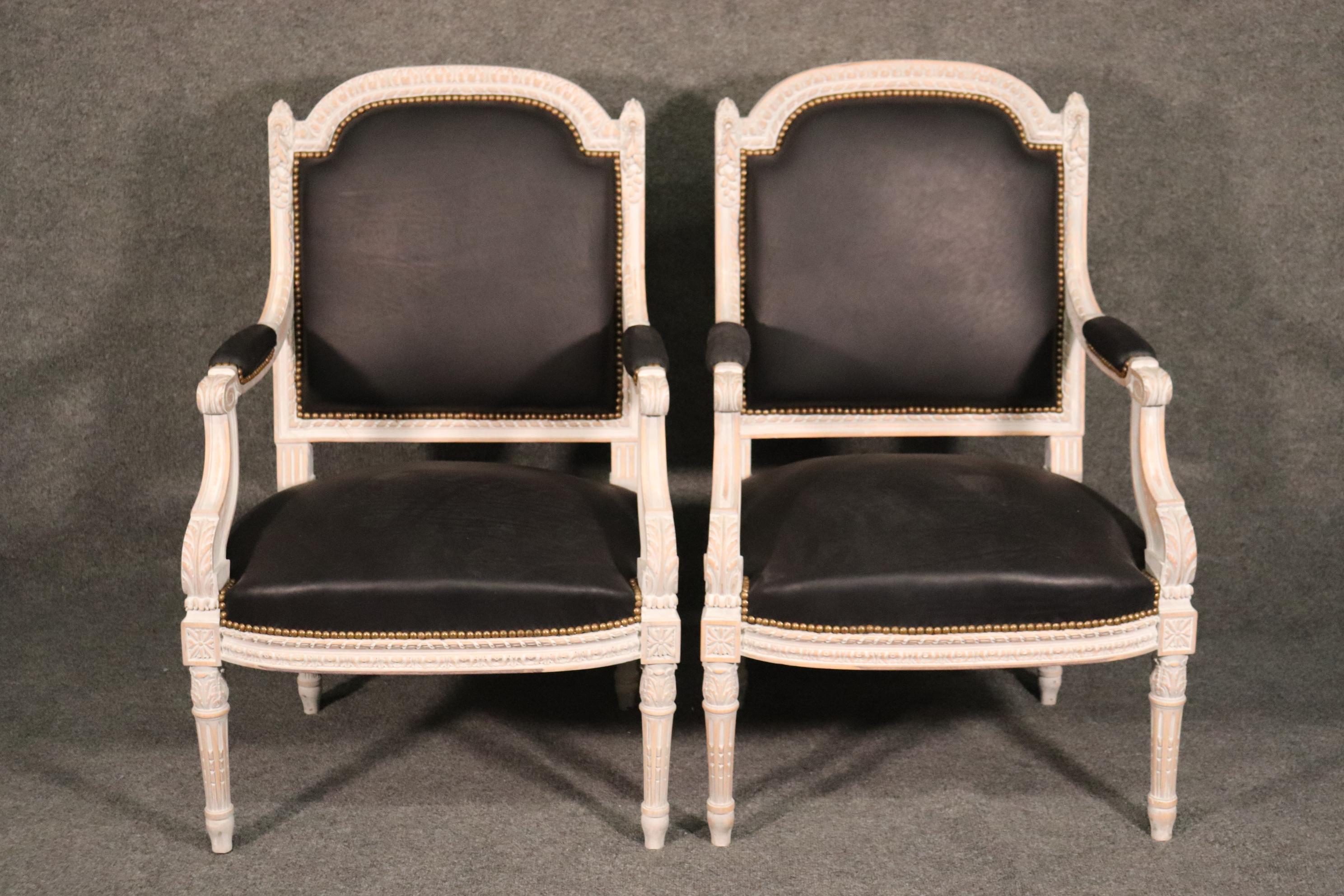Pair Carved White Paint Decorated French Louis XVI Style Armchairs with Leather In Good Condition In Swedesboro, NJ