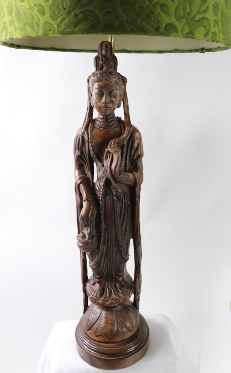 20th Century Pair of Carved Wood Tibetan Buddha Table Lamps For Sale