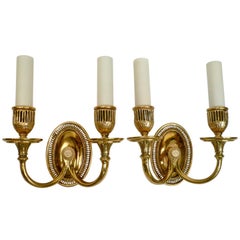 Pair of Cast Bronze Oval Back Sconces by E. F. Caldwell