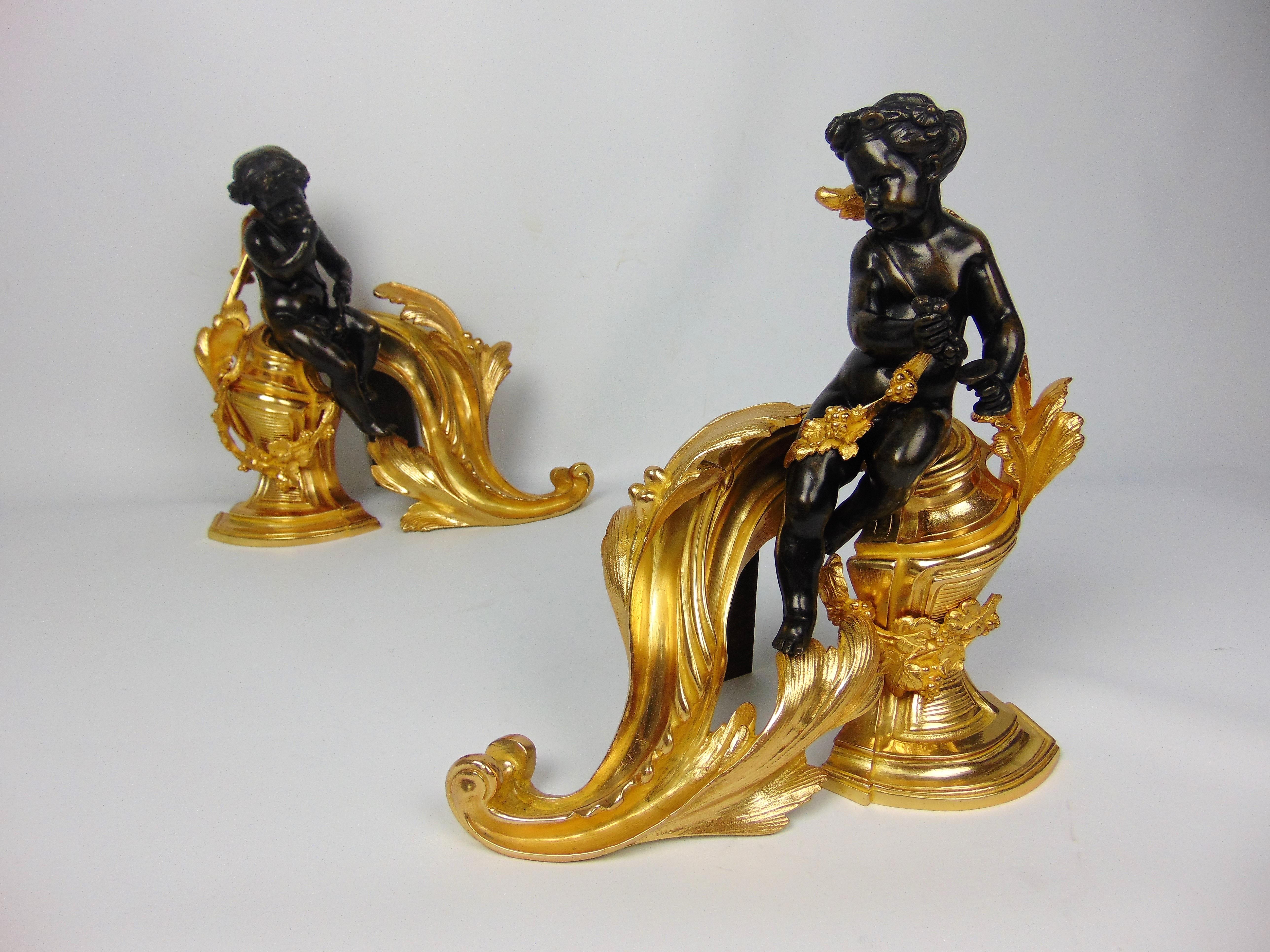 A quality pair Chenet cast in the form of Bronze Cherubs / Putti one pulling and squeezing grapes from the gilt vine whilst the other tastes whilst resting on Ormolu roccoco style bases .
31cm wide x 32cm tall x 15cm deep
Circa 1890.