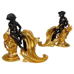Paire de chérubins/putti en forme de chérubins en bronze coulé