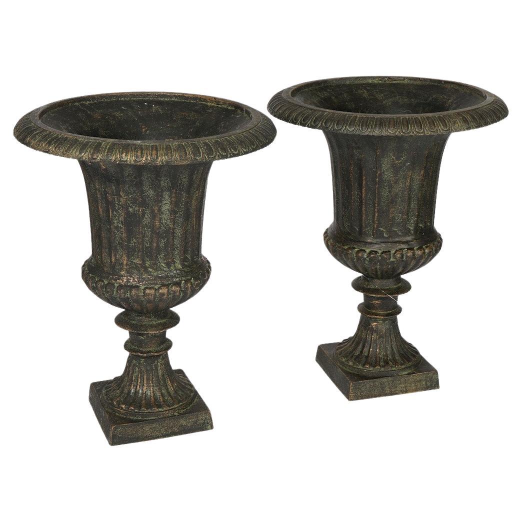 Pair Embossed Cast Iron Classical Double Handled Garden Urns on Plinths