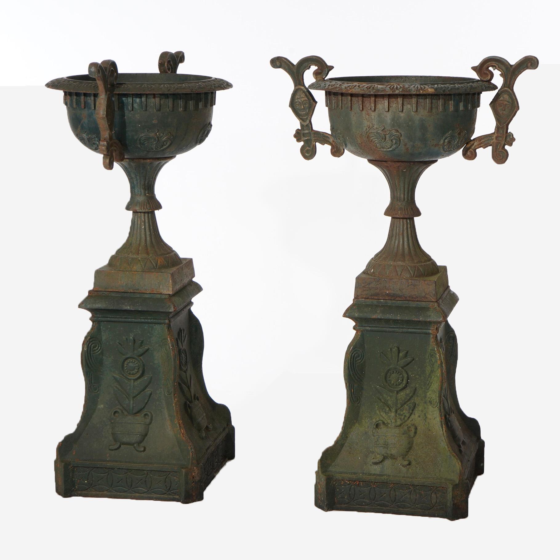 Pair Cast Iron Handled Grecian Urns on Floral Embossed Plinths 20th C 1