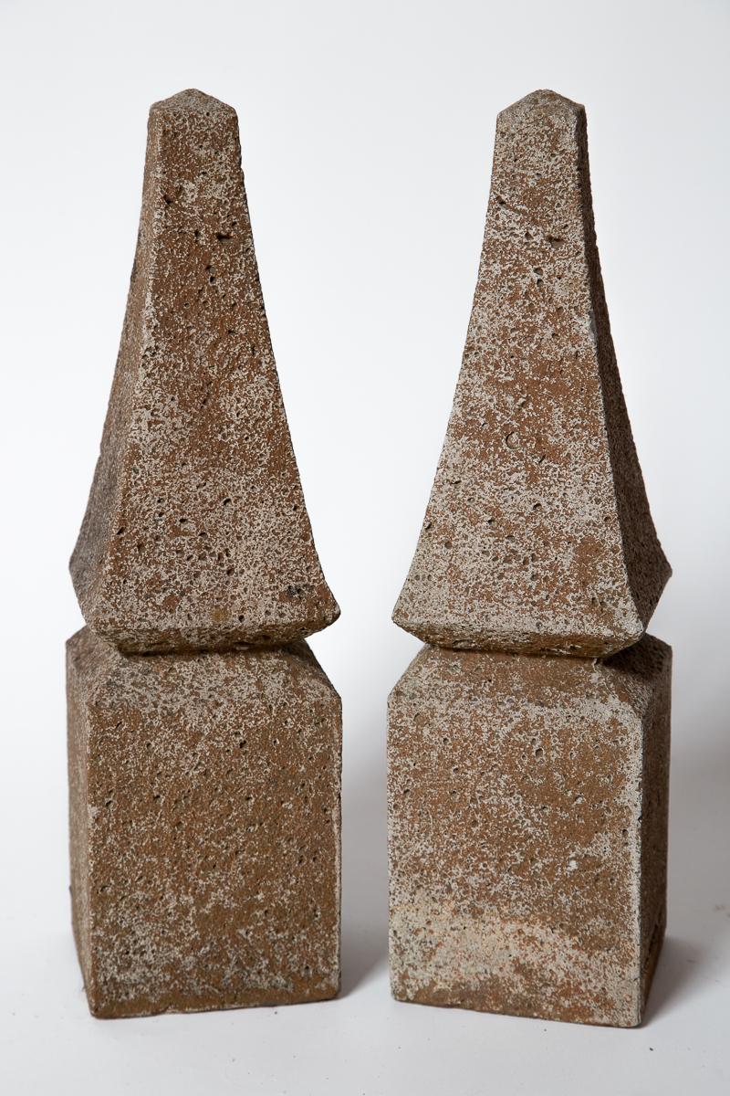 Pair Cast Stone  Garden Obelisks, 20th Century. From a Connecticut estate, a lovely pair of garden ornaments with weather patina.
