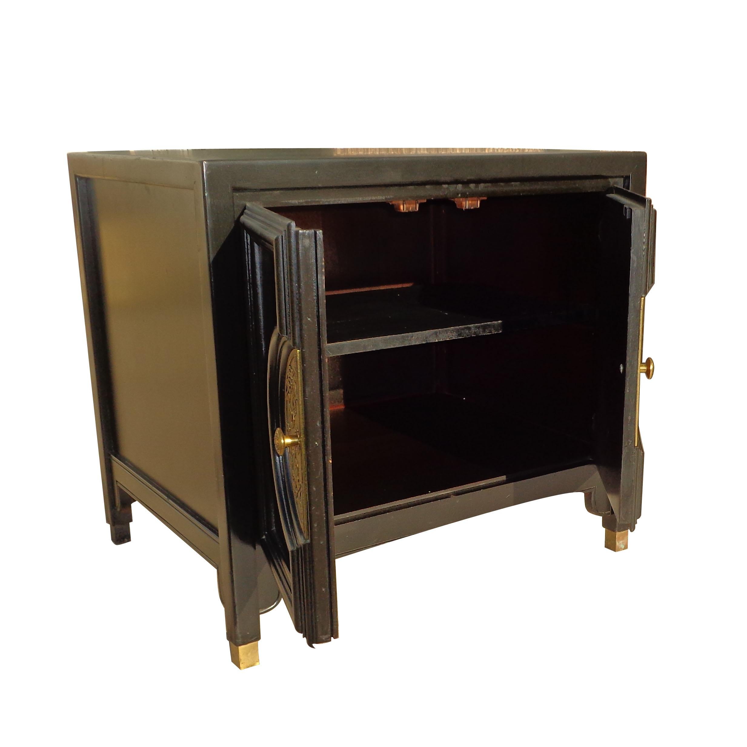 Pair of Century Furniture Chin Hua nightstands

Pair of Century Furniture Chin Hua nightstands

Pair of Chin Hua nightstands by Century Furniture. Ebonized cases with brass hardware and brass-tipped feet. 
Open cabinet space with shelf. Stamped with